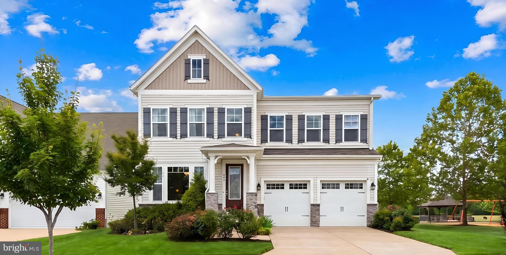 Welcome to 995 Aspen Rd, a spacious and beautifully maintained home in Embrey Mill with an attractive, assumable 2.25% VA mortgage. This one-of-a-kind Dream Finders model offers a versatile floor plan, multiple living areas, and a desirable setting with no homes directly behind. Designed for both everyday living and effortless entertaining, this Colonial-style residence features 4 bedrooms, 4.5 baths, an oversized 2+ car garage, and three finished levels of thoughtfully designed living space.

The main level welcomes you with a two-story foyer, hardwood flooring, and an open, functional layout. The kitchen is a true centerpiece with quartz countertops, gray soft-close cabinetry, stainless steel appliances, gas cooking, double wall ovens, a center island, backsplash, table space, and a generous pantry and mudroom area off the garage entry. The kitchen flows easily into the family room, creating a natural gathering space, while the composite deck extends the living area outdoors and overlooks the open rear setting.

Upstairs, the primary suite offers a walk-in closet and a well-appointed en-suite bath with dual vanities, quartz countertops, a tiled shower, water closet, and tile flooring. Three additional bedrooms provide flexibility, including a secondary bedroom with a private bath and two bedrooms that share a common bath. A spacious loft creates the perfect space for movie nights, gaming, or a second family room. The upper-level laundry room adds convenience with tile flooring, storage space, and attic access.

The walk-out lower level expands the home with a recreation room, flex space that would make a great guest room, full bath with tiled shower, and a finished storage room that could also serve as an office, gym, or hobby space. With three distinct living spaces—including the main-level family room, upper-level loft, and lower-level rec room—there is room to work, relax, host, and spread out.

Additional highlights include 2x6 exterior wall construction, a finished oversized garage with lifetime polyaspartic floor, EV Tesla charger, an exterior generator plug, sprinkler system, thoughtful landscaping on three sides, and a unique garage climbing wall. The home is ideally positioned near a playground within Embrey Mill, one of Stafford’s most popular communities known for its neighborhood amenities, parks, trails, and convenient access to shopping, dining, commuter routes, and everyday essentials. Some photos have been virtually staged to help illustrate the potential use and layout of the spaces