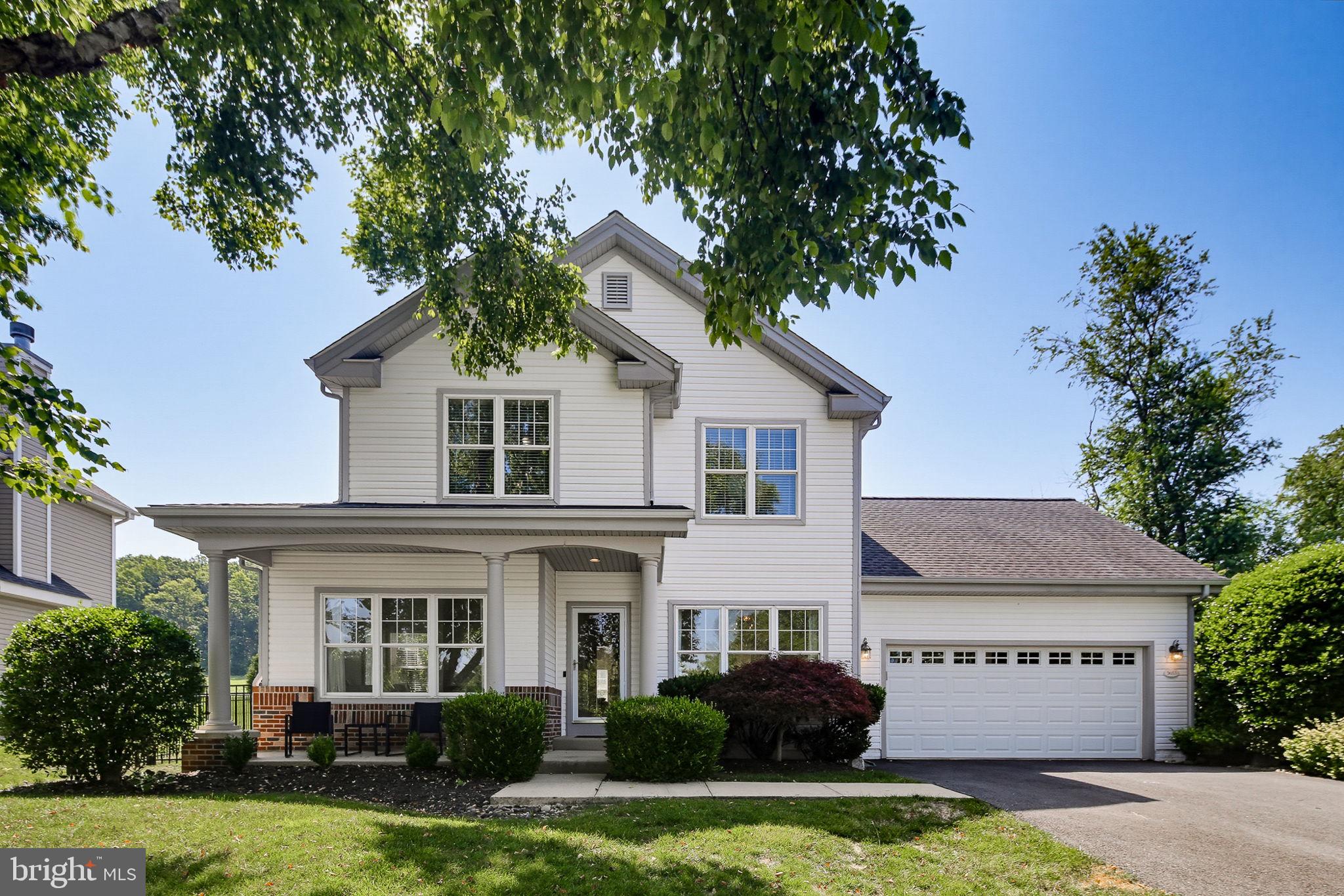 Welcome to this stunning  4-bedroom, 2 full and 2 half bath home, perfectly situated in the highly sought-after Meadows at New Market community. Filled with abundant natural light, this exceptional residence showcases a beautifully updated kitchen, refinished hardwood floors throughout the first and second level with new solid oak hardwood flooring in two bedrooms, and a spacious floor plan designed for both comfortable everyday living and effortless entertaining. 

A welcoming foyer opens to generous living spaces throughout the main level. At the heart of the home, the fully renovated eat-in kitchen impresses with upgraded cabinetry featuring a convenient appliance garage, elegant quartz countertops, and solid quartz backsplash that creates a sleek, seamless look while making everyday cleaning effortless. A suite of all-new kitchen appliances, including an induction cooktop, wall oven, dishwasher, and refrigerator- was carefully chosen for its reliability, durability, and everyday performance. A breakfast bar and sunny breakfast nook overlook the peaceful backyard, creating the perfect setting for morning coffee or casual meals. Originally designed with a gas range, the home still retains the existing gas line, offering the flexibility to convert back to gas if desired.

Just off the kitchen, the inviting family room centers around a cozy wood-burning fireplace, creating the perfect gathering space. Formal living and dining rooms provide additional room for entertaining, while a convenient half bath and mudroom with a new washer and dryer offer everyday functionality and direct access to the attached two-car garage.

Upstairs, the spacious primary suite serves as a private retreat with a walk-in closet and a spa-inspired en-suite bath featuring a soaking tub, separate walk-in shower, and dual vanity. Three additional generously sized, sun-filled bedrooms and a full hall bath complete the upper level.

The finished lower level expands the home's living space with a large recreation room, dedicated bar area, and an additional half bath, making it ideal for movie nights, game days, or casual entertaining.

Step outside to your private backyard retreat, where a spacious patio overlooks the fenced yard and serene farmland beyond, offering peaceful views and exceptional privacy. Whether hosting friends or enjoying a quiet morning coffee, this outdoor setting feels like a true escape.

Conveniently located within walking distance of shops, restaurants, and all that historic New Market has to offer, this move-in-ready home combines exceptional updates, generous living space, scenic views, and an unbeatable location. The list goes on and on!