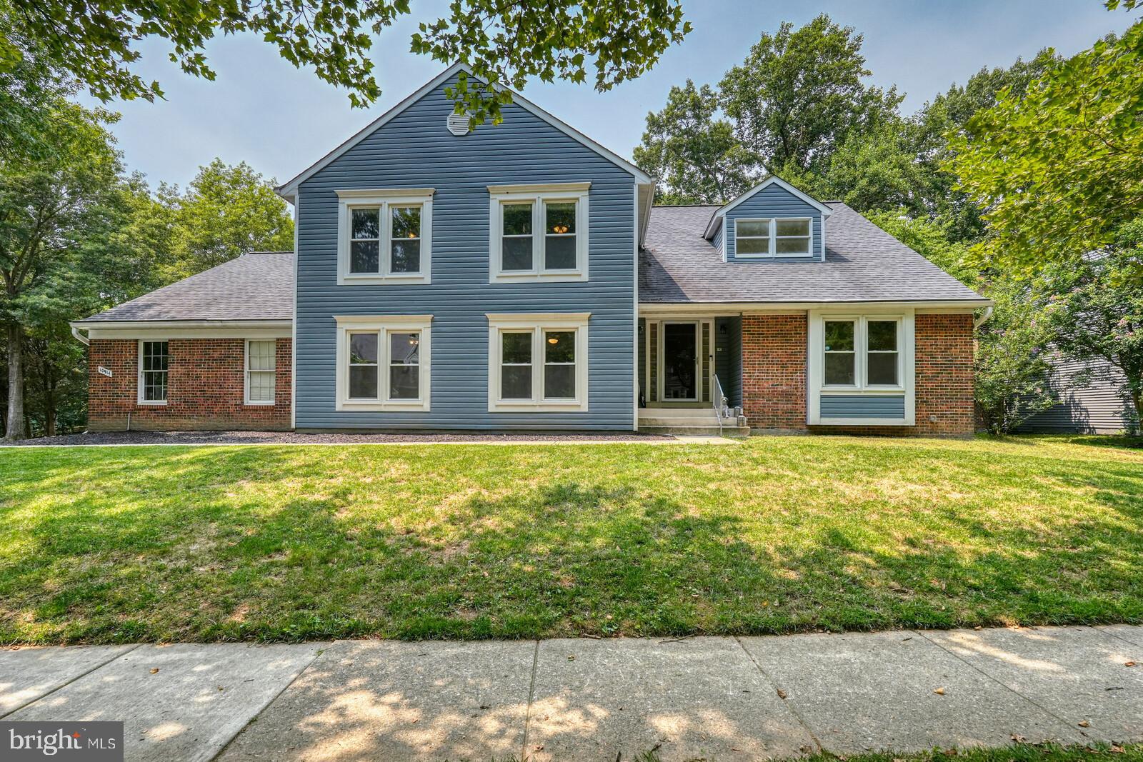 Exceptional space, a thoughtfully designed floor plan, and significant capital improvements make this one of the area’s standout homes. Offering over 3,600 square feet across four levels plus a finished basement, this residence provides the flexibility today’s buyers are looking for without compromising comfort or functionality.

The main level is designed for gathering and everyday living, featuring spacious formal and casual living areas, a kitchen with granite countertops, a welcoming family room anchored by a Regency gas fireplace, and a sun-filled sunroom overlooking the fenced backyard and patio.

A rare highlight of this home is the upper level, where you’ll find five generously sized bedrooms and two full bathrooms, including a spacious primary suite with vaulted ceilings and a private sitting room that’s perfect as a home office, nursery, or quiet retreat.

The lower level offers exceptional versatility with an additional bedroom, full bathroom, and expansive living area, creating the perfect space for overnight guests, extended family, or multigenerational living. The finished basement provides even more room for recreation, fitness, hobbies, or a media room, along with abundant storage.

Equally impressive are the investments made behind the walls. The current owners prioritized the home’s long-term value with a newer roof, all-new windows throughout, updated HVAC and boiler systems, a Regency gas fireplace insert, fresh exterior paint, and new flooring throughout the upper level, basement, and additional living areas. With no carpeting anywhere, the home offers a clean, timeless aesthetic that’s both beautiful and easy to maintain.

Complete with a three-car garage, multiple indoor and outdoor living spaces, and a floor plan designed to adapt to every stage of life, this is a home that offers not only exceptional space, but lasting value and peace of mind.
