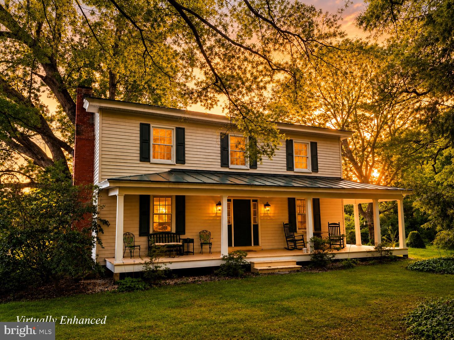There are homes that simply provide shelter, and there are homes that tell a story. This beautifully preserved and thoughtfully expanded circa 1880 farmhouse is one of those rare places where history, comfort, and modern living come together.

Set on nearly 8 peaceful acres, the home was extensively renovated and expanded in 2005, carefully preserving the craftsmanship and character that make older homes so special while adding the conveniences today’s buyers appreciate. Original heart pine floors, antique doors, vintage hardware, soaring ceilings, beautiful moldings, and four decorative fireplaces create warmth and personality throughout.

With over 3,100 square feet, the flexible floor plan offers three private bedroom suites, including primary suites on both the first and second floors, making the home adaptable for changing needs, guests, or multi-generational living. The spacious kitchen serves as the heart of the home with abundant cabinetry, double wall ovens, gas cooktop, newer Samsung refrigerator, generous workspace, and an inviting sunroom that overlooks the property.

Step outside and you’ll discover porches on multiple sides of the home, a private deck off the first-floor primary suite, an outdoor fireplace, mature landscaping, raised garden beds, fruit trees, and one of the area’s most remarkable features—a majestic oak estimated to be more than 200 years old. Whether enjoying your morning coffee on the wraparound porch or watching the stars fill the night sky, this property offers a peaceful setting that’s increasingly difficult to find.

The A-2 zoning provides flexibility for a variety of rural lifestyles, and the seven outbuildings, barn, smokehouse, former barber shop, and additional accessory structures offer incredible opportunities for hobbies, storage, workshops, gardening, or future projects.

Additional improvements include replacement windows throughout, updated electrical during the renovation, zoned heat pumps, a four-bedroom septic system, and an electric pet fence. Located just minutes from Pleasants Landing at Lake Anna while remaining convenient to Richmond, Fredericksburg, Ashland, Mineral, and Louisa, this property offers the perfect balance of country living and accessibility.

If you’ve been searching for a home with authentic character, modern comfort, usable acreage, and room to make it your own, 1311 Borden Road is a property you’ll want to experience in person.