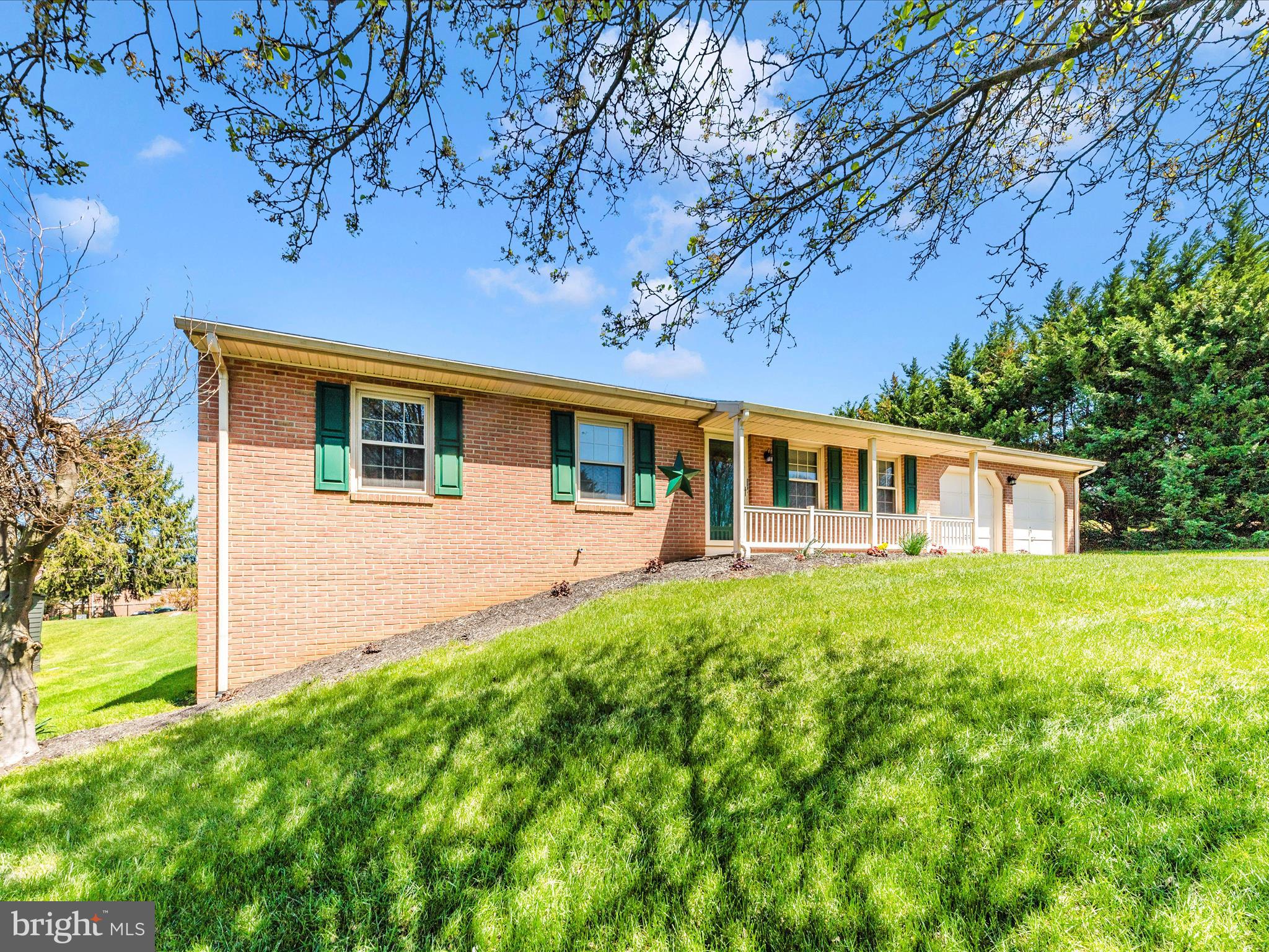 WELCOME HOME SWEET HOME ** Get ready to see this Immaculate all Brick 3 Bed 2 Bath Rancher 1st floor living at its finest in a desirable community.  This gem in Potomac Manor features a sunken in living / family room with cathedral ceilings and great lighting with oak ceiling.  ALL NEW Fresh paint- Gleaming Hardwood floors thorough and brand-new carpet in the bedrooms.  The full basement is a great place to finish to your touches.  Newer appliances.  Roof 10 yrs- HVAC and furnace are 2020- and many other updates.  There is a 2 Car garage on a great level lot with NO HOA..  Close to shopping and commuter routes.  This is turnkey move in ready and a must see!!