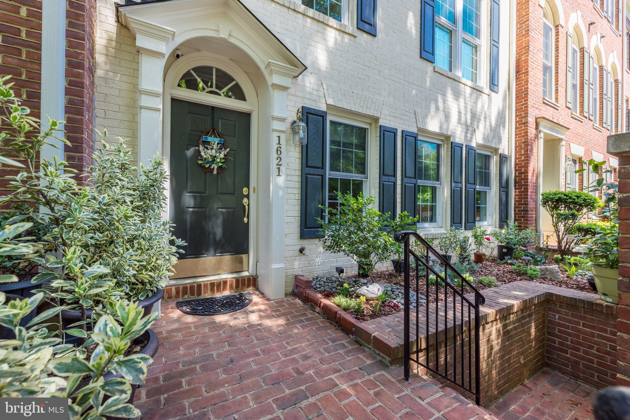Mint condition  all brick townhouse with lovely courtyard entrance * Just blocks to the McLean Station Silver Line Metro and the newly opened Wegman's super store.  Light filled throughout with high ceilings, balcony, roof deck, gas fireplace and hardwood floors on all three levels * Two car garage * Pride in ownership shows throughout * New roof and gutter guards *  New kitchen appliances * New kitchen bar countertop * All new windows and external doors * Renovated  owner bathroom and upper level bathroom *New solar blinds * New washer and dryer * New LED overhead lighting throughout * New HVAC systems * New 50 gallon hot water heater *