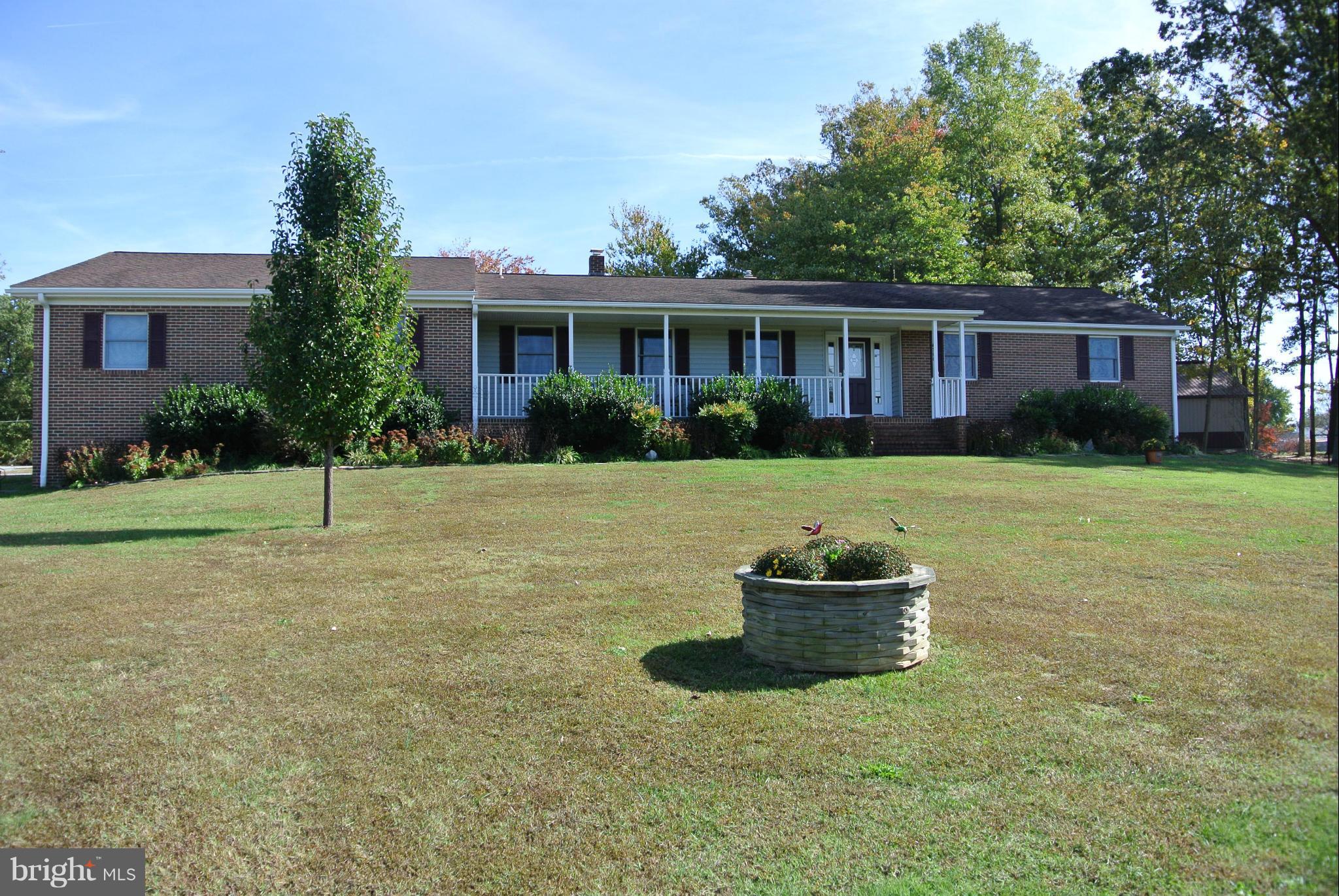 Immaculate Rambler with many upgrades. Huge Attached Garage , Detached 30x30 Garage with electric. 26 X 44 Pole Barn. Large screened in porch. Updated Kitchen and Baths. Master bath has free standing Hydro-Therapy tub. Updated, Windows, Newer Ac, New Septic, New Deep Well. Shows like a model. Eligible for 100% Financing thru USDA Rural Development (If Qualified)