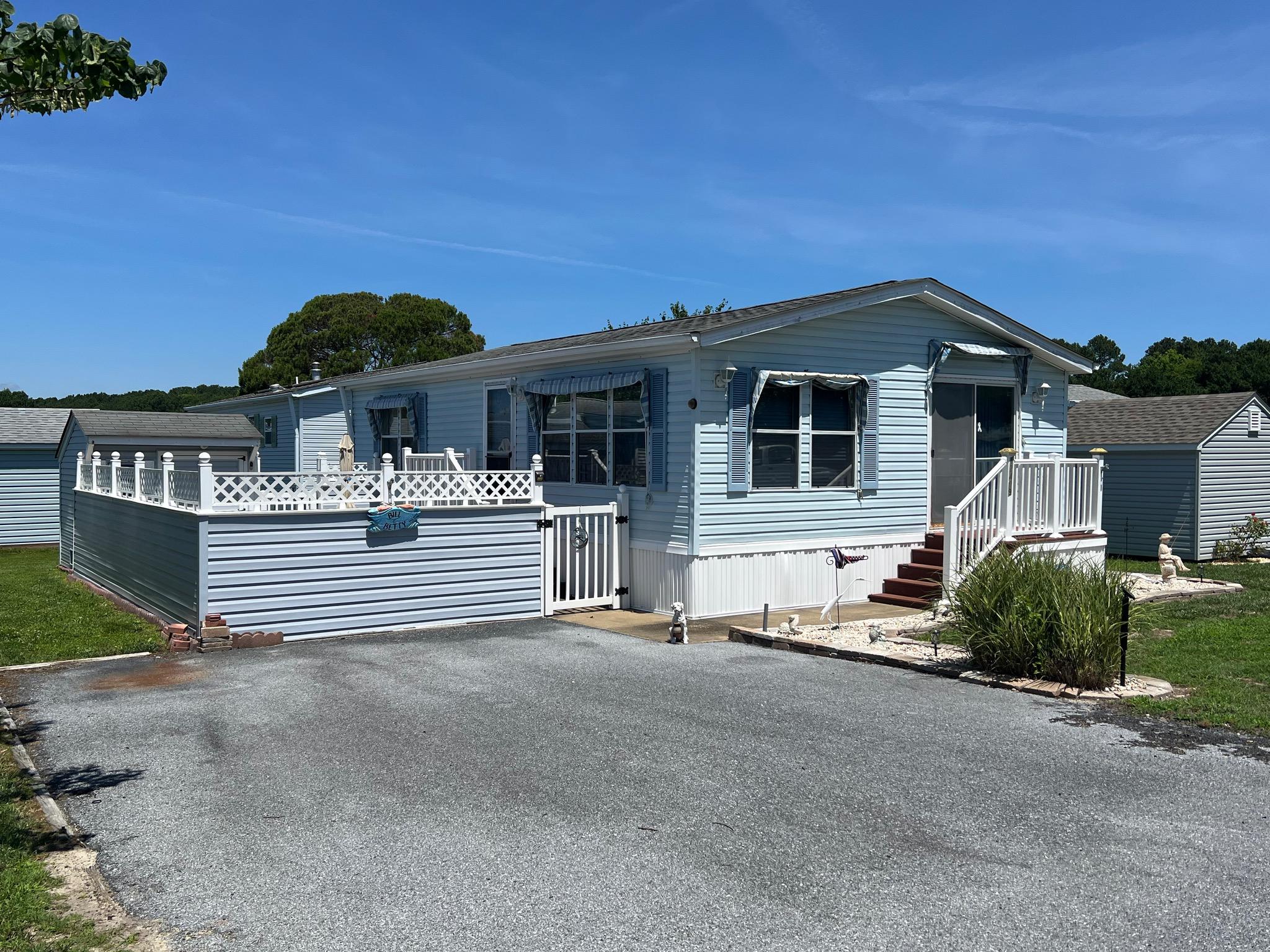 Nice Turn Key 2 Bedroom. Updated Roof & Furnace. Spacious Eat in Kitchen. Large Master Bedroom with King Bed. Skylights Provide Lots of Natural Light. Courtyard, Shed & Awnings.