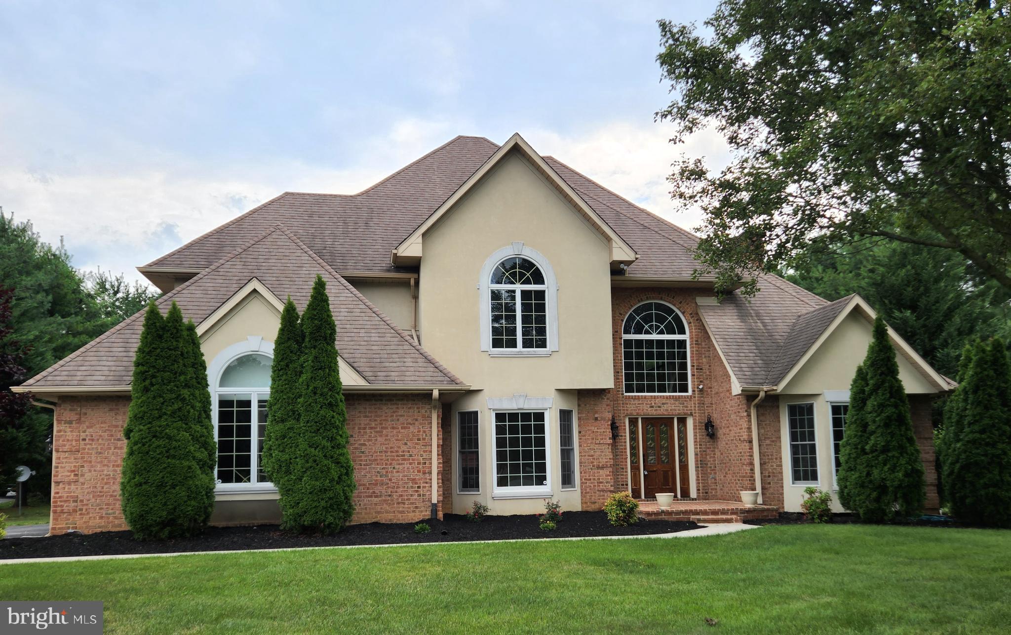 This 3,600+ Sq Ft Traditional Style Home  Has A Brick Exterior With Stucco & Keystone Accents, A 2 Story Foyer With Arched Fixed Panel Window That Illuminates The Foyer Area, A  Formal Living Room/Home Office With Bay Window, 4 Generous Size Bedrooms, Primary Bedroom Has Tray Ceiling, 2nd Bedroom Has A Vaulted Ceiling, 2.5 Baths Have Been Beautifully Updated: New Paint From The Finished Basement To The 2nd Floor Bedrooms, New Door Hardware, Remote Control Ceiling Fans & LED Designer Lighting, Primary Bathroom Renovated With New Vanity & Double Wave Bowl Cultured Marble Top & Faucets, Ceramic Shower, Glass Sliding Shower Door, Fabulous Double Slipper Soaking Tub And Ceramic Floor. New Kitchen Cabinets-Slow Close Doors/Drawers With Custom Hardware, 6' Island, Granite Countertops, 60/40 Double Stainless Steel Sink, Garbage Disposal, Ceramic Flooring,  & New LG Stainless  Steel Appliances.  Large Family Room Off The Kitchen Dining Area With Brick Fireplace /Wood Stove Insert,  Formal Dining Room With Bay Window, Crown/Picture Frame Molding, Chair Rail, 1,000+ Sq Ft Lower Level Has New Paint & Carpet In A Large Finished Rec Room/Game Room/Media Room, Separate Finished Room For An Office,/Playroom, & 2 Unfinished Rooms, One With The Furnace & 2 New 40 Gallon Hot Water Heaters Plus Great Spaces For Storage.  Furnace & CAC Installed June 2020. Roof Approximately 15 Years. Driveway depressions, cleaned out/leveled and entire driveway resurfaced with 2" of compacted Asphalt!  Located in a Subdivision of Fine Homes In The Rural Community of Washington County MD, Yet It Is Convenient To Many Desired Destinations, for Work & Recreation, East/West, North/South Due to I-70 & I-81 Interstate Highways. Minutes To Meritus Medical Center, Hagerstown Community College, Black Rock Golf Course, County Parks, Restaurants and Shopping. Approximately An Hour & 15 Minutes Drive To Washington DC & Baltimore MD.