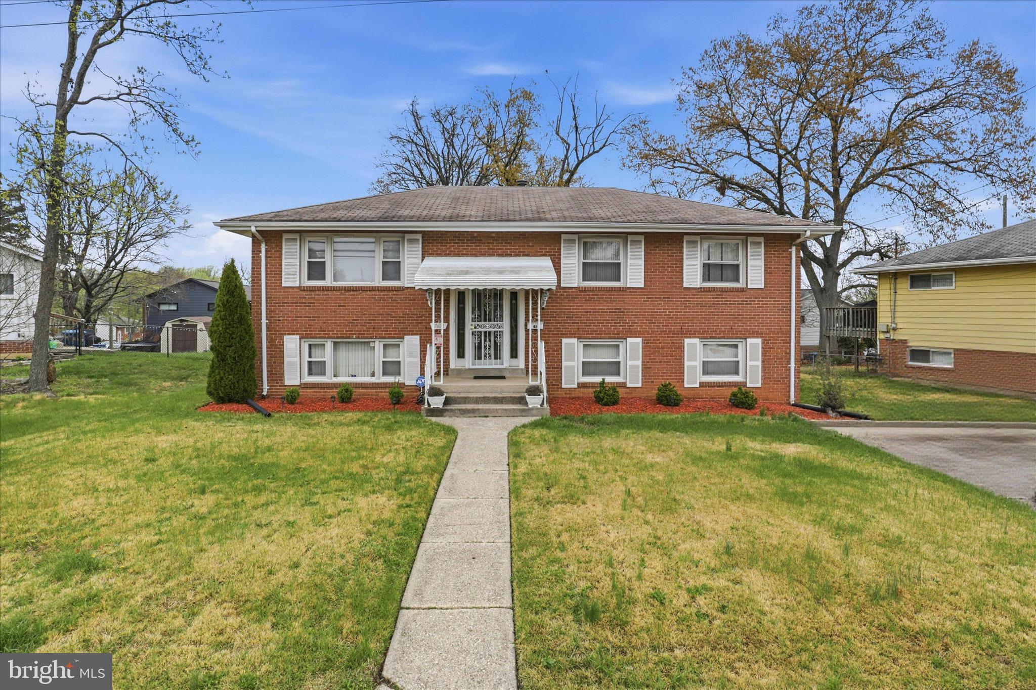 *ELIGIBLE FOR SPECIAL CENSUS TRACT FINANCING, 0 DOWN, NO PMI, & $5000 GRANT TOWARD CLOSING COSTS..** Estate Sale. Seller working with Blue Note Title for Estate. Classic all-brick split-level on a generous, level lot in District Heights. This is the kind of well-built home that doesn't come cheap anymore. The sellers have already done the heavy lifting where it counts: the HVAC was replaced in 2023, a fully renovated kitchen with new shaker cabinetry, tile backsplash, and a bright eat-in nook; plus new hardwood floors that run throughout the main living areas and bedrooms. The living and dining rooms flow easily into each other, and a sliding glass door off the dining room leads directly to the rear deck - great for summer entertaining.

The main level has two bedrooms but could easily be converted back to three bedrooms per the original floorplan. Both bedrooms offer ample closet and storage space.

The lower level adds serious square footage: a large, family room, two additional bedrooms and a second full bath with tub/shower combo. There is a utility/storage area with new LVP flooring. Whether you need space for extended family, a home office, or a creative studio, the layout delivers.

Out back, a raised deck off the dining room overlooks a flat yard with a patio at grade level and a storage shed - more outdoor living space than most comparables in the area. The front curb appeal is classic brick with fresh mulch and mature landscaping.

Located minutes from the Beltway, Andrews AFB, Marvin Gaye Park, District Heights Recreation Center, Walker Mill Regional Park, Target, and shopping.