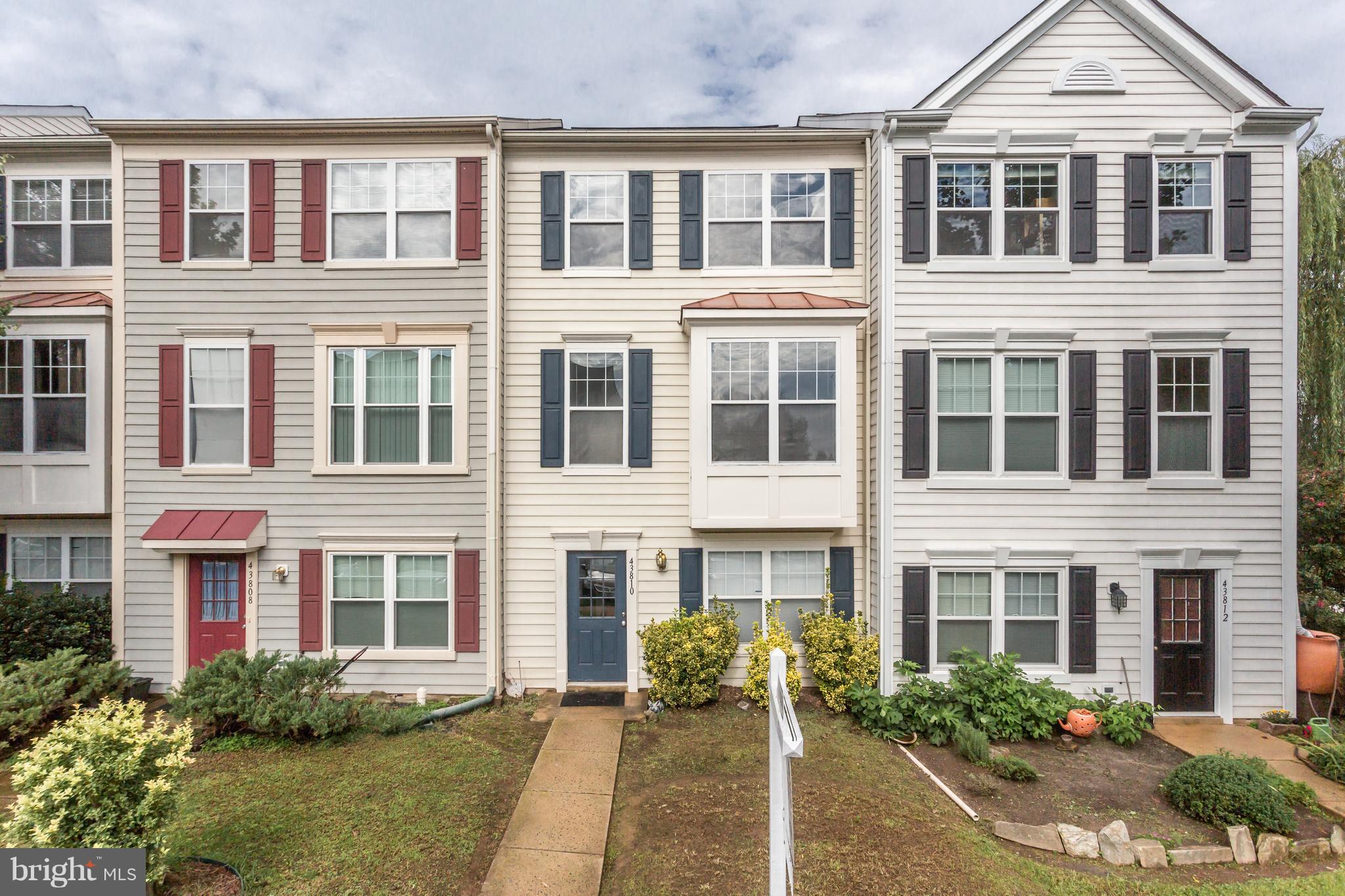 Price reduced! This immaculate 3 level townhouse sparkles!  New Carpet! Freshly painted! Entrance on ground level into 2 story foyer. Bright kitchen open to deck with views of mature trees and beautiful green area. Finished lower level with walk out to back yard.  Short walk to community swimming pool, basketball and tennis courts and tot lot.  Easy access to major roads and shopping.