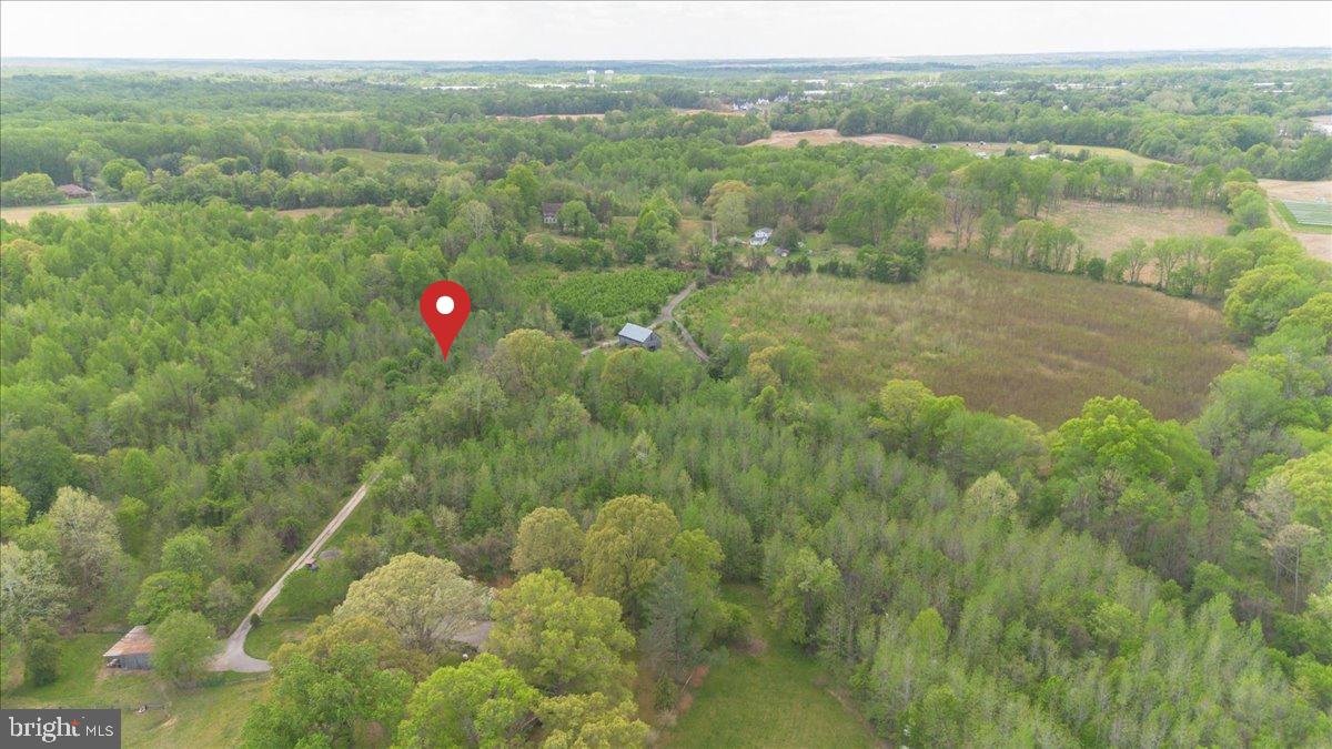 Discover 6.3 acres of opportunity in Upper Marlboro. Offering a private and scenic setting surrounded by established properties and natural beauty, this substantial parcel provides a rare chance to own acreage in a location that balances tranquility with accessibility.

Conveniently situated near major commuter routes, Joint Base Andrews, and the amenities of the Washington metropolitan area, the property may appeal to those seeking land for personal enjoyment, long-term investment, or to explore future possibilities. An adjacent parcel is also available for purchase, presenting a unique opportunity for buyers seeking additional acreage or flexibility.

Seller has retained a soil scientist to conduct soil evaluations and perc testing in coordination with the Prince George's County Health Department. Buyer will be afforded a limited study period to consult with  applicable county agencies regarding potential development considerations.

Buyer to independently verify zoning, permitted uses, utility availability, development potential, and all other information material to their intended use of the property.