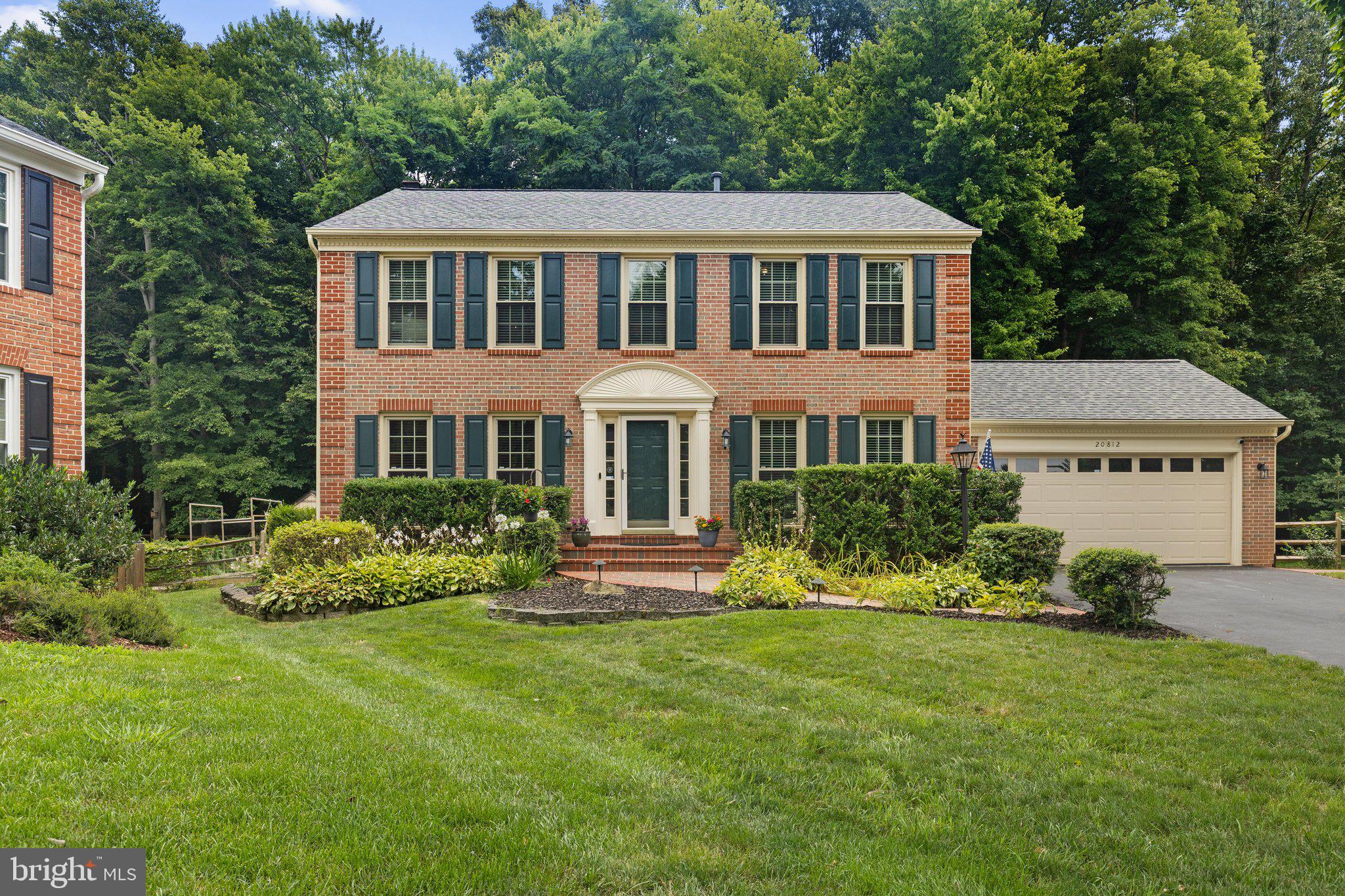 Perfectly tucked within the coveted Lowes Island enclave of Cascades, this beautifully updated brick-front Colonial combines timeless architecture with modern comfort, all set on a quiet cul-de-sac backing to a wooded common area. The private setting offers a peaceful retreat while placing you just moments from the exceptional amenities that have made Cascades one of Loudoun County's most desirable communities. Residents enjoy miles of scenic walking and biking trails, five community pools, fitness centers, tennis and pickleball courts, playgrounds, sports fields, community centers, shopping, dining, and convenient commuter routes. 

Designed for both everyday living and effortless entertaining, the home offers four bedrooms, three full bathrooms, one half bath, and three finished levels. Rich hardwood flooring extends throughout the main level and continues up the staircase, while crown molding and recessed lighting enhance the home's warm, inviting character. Formal living and dining rooms flow into the welcoming family room, where a gas fireplace creates the perfect gathering place.

The beautifully remodeled kitchen, completed in 2023, blends timeless style with exceptional functionality. Quartz countertops are paired with high-end Bosch and GE Profile appliances, a designer range hood, decorative cabinet end panels, abundant cabinetry, and a spacious pantry. A reverse osmosis water filtration system, installed in 2026, adds everyday convenience.

Upstairs, the spacious primary suite serves as a relaxing retreat with room for a sitting area, separate walk-in closets, and an ensuite bath featuring dual vanities, a corner soaking tub, separate shower, private water closet, and supplemental heater for year-round comfort. Three additional bedrooms provide comfortable spaces for family, guests, or home offices, while one is being used as a custom dressing room which shows the creative flexibility this plan offers.   Plush carpeting installed in 2021 enhances the upper level.

Remodeled in 2021, the fully finished lower level expands the home's versatility with durable luxury vinyl plank flooring, a spacious recreation room currently used as a home gym, a full bathroom, utility sink, oversized water softener, built-in Bose speakers that convey, and generous unfinished storage. Whether used as a recreation room, fitness studio, craft room, or teen retreat, the space easily adapts to your lifestyle.

Outdoor living is equally inviting. The expansive screened porch overlooks peaceful woods, creating a bug-free sanctuary to enjoy morning coffee, gentle rainstorms, colorful autumn foliage, and visiting hummingbirds. The flagstone patio and fully fenced backyard provide wonderful spaces for entertaining, gardening, or relaxing. Fresh mint, mature holly, boxwoods, hostas, and vibrant daylilies provide effortless seasonal beauty, while deer, foxes, squirrels, chipmunks, and countless birds make the wooded backdrop feel like a private nature preserve.

Thoughtfully maintained and extensively improved, the home features a remodeled kitchen (2023), remodeled basement (2021), HVAC system (2021), 74-gallon water heater (2021), new siding (2022), replacement windows, reverse osmosis system (2026), and numerous additional updates throughout. A spacious two-car garage with a professionally finished epoxy floor adds both style and durability, providing an attractive, easy-to-maintain space for vehicles, storage, or hobbies.

Beautifully updated, meticulously maintained, and ideally positioned in one of Lowes Island's most sought-after neighborhoods, this home offers more than exceptional finishes. It offers an unmatched lifestyle where neighbors become lifelong friends, nature is part of everyday life, and the renowned Cascades amenities are just moments from your front door.