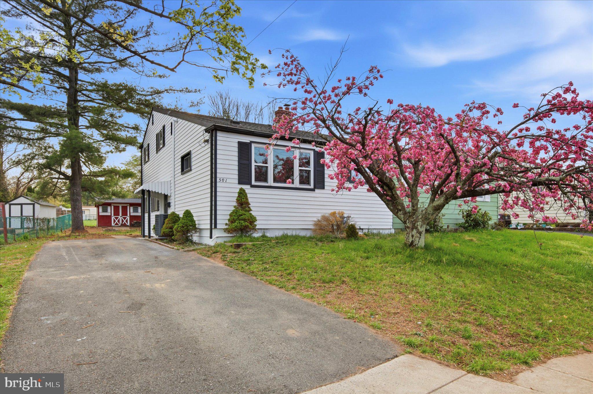 This charming split-level Lansdale home offers a perfect blend of comfort and modern living. With 1,430 square feet, this newly-renovated property features 3 inviting bedrooms and 1.5 bathrooms - move in and start enjoying your new home immediately! Upgrades include new roof, new kitchen, new tiled bathrooms, new vinyl flooring throughout, and central A/C added. Step inside to discover an open floor plan that seamlessly connects the brand new kitchen, adjacent dining area, and living space. The kitchen is equipped with white shaker cabinetry and a full package of new appliances, making meal preparation and clean up a delight. The combination of vinyl and tile flooring throughout adds a touch of elegance while ensuring easy maintenance. Enjoy the comfort of a spacious fenced rear yard with patio space accessed by sliding glass door, perfect for outdoor gatherings or quiet evenings under the stars. The property also includes a shed for additional storage, ensuring your space remains clutter-free. Parking is a breeze with a driveway accommodating multiple vehicles. Located less than a mile from bus stops and a commuter rail station, this home offers easy access to transportation options, making your daily commute a little easier. This is not just a house; it's a place to create lasting memories. Schedule a showing and make your offer today!