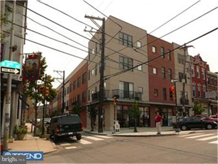 Welcome to Poplar Estates, a high-end living experience in the heart of Northern Liberties. Few condominiums offer security and convenience of deeded garage parking. Ride the elevator to the 3rd floor to your bi-level flat. Enter to a spacious layout with hard wood flooring, flooded with natural light, and top notch custom lighting and window treatments throughout. The first floor features include a conveniently tucked away powder room with granite counters and mirrored storage amoire. Find ample storage in the double wide hall closet. The kitchen includes stainless appliances, plenty of beautiful cabinets, and pristine granite counters. The best is yet to come. Take notice to the width of the stairs as you walk to the second level to your private get away suite. The full bath, laundry and utility room are in the hall. The large bedroom with custom built in wood cabinets and full size walk out deck with view is amazing.