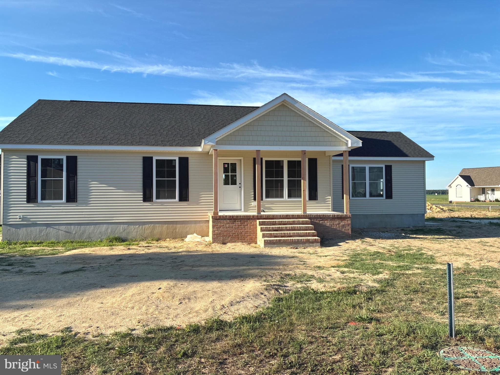 Welcome to this beautifully crafted new construction rancher nestled on a quiet corner lot in Hurlock, Maryland. Offering 3 bedrooms and 2 full bathrooms within 1,120 square feet, this thoughtfully designed home makes excellent use of every space. The open-concept layout seamlessly connects the kitchen and living area, creating a comfortable setting for everyday living and entertaining. The kitchen features stainless steel appliances, elegant quartz countertops, and a pantry with built-in shelving. Conveniently located just off the kitchen is a dedicated laundry closet with double doors. The primary suite offers a walk-in closet and private en-suite bathroom complete with a quartz-topped vanity and tiled walk-in shower. Two additional bedrooms provide comfortable accommodations with generous closet space, while the second full bath features a tub/shower combination and quartz countertops. Exterior highlights include a welcoming front porch with brick rowlock detailing and brick steps, a rear stoop, and an attached side-entry 1-car garage offering 360 square feet. Situated on a peaceful corner lot, this home offers low-maintenance living in a charming small-town setting.
Home is currently under construction and expected to be completed in approximately 3 weeks. Photos will be added once home is complete. Home includes the builder’s one-year warranty. Showings are available now by appointment.