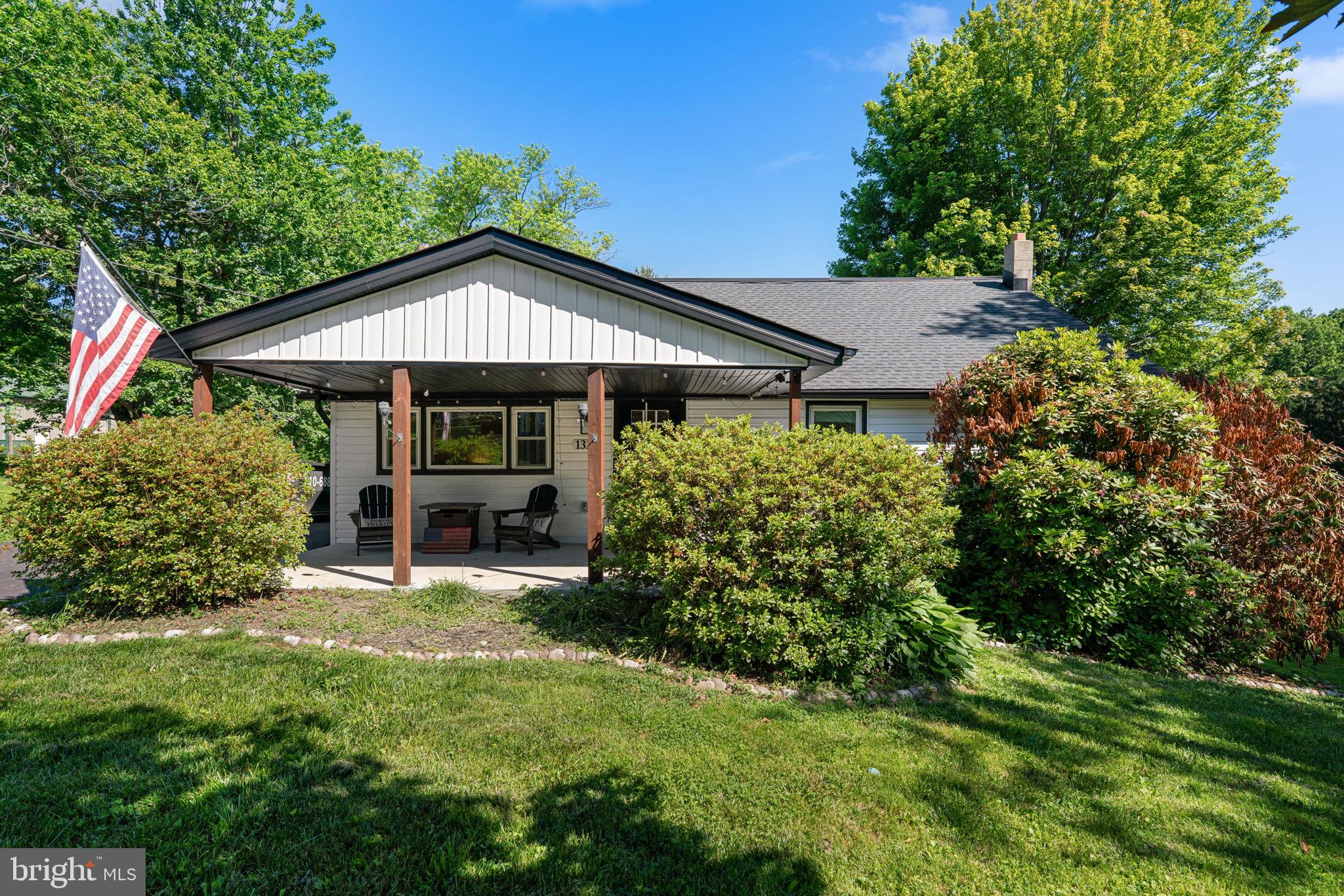 Welcome home to 1320 Sharon Acres Rd, a beautifully updated sanctuary nestled on a private 3.5-acre lot. Originally fully renovated with premiere finishes throughout, the current owners purchased the home in 2024 and have since added high-value infrastructure upgrades for ultimate peace of mind, including a brand-new well installed in 2024 just after purchase, a newly expanded driveway for ample parking, and a brand-new outdoor storage shed. The main level welcomes you with an open-concept floor plan, a large living room with a decorative fireplace and reclaimed wood mantle, and a chef's kitchen featuring chic shaker cabinets, brushed gold fixtures, crisp quartz countertops, a large island, and a dining area that walks out to a large deck. The main-level primary en-suite offers a spa-like bathroom with a custom vanity, brushed gold fixtures, and a large walk-in shower with Calcutta tile, complemented by two additional spacious bedrooms and a fully renovated hallway bathroom featuring Italian scallop porcelain wall tile and octagon floor tile. The upper level boasts two large bedrooms along with a dual-entry bathroom, perfect for a second en-suite or room sharing, while the finished lower level provides the ideal space for a family room, den, or office, complete with its own full bathroom. Combining these recent 2024 exterior additions with the home's existing brand-new electric, plumbing, HVAC, septic system, and roof, this turnkey property offers unparalleled modern comfort, lower maintenance costs, and rural serenity. Mortgage savings may be available for buyers of this listing.