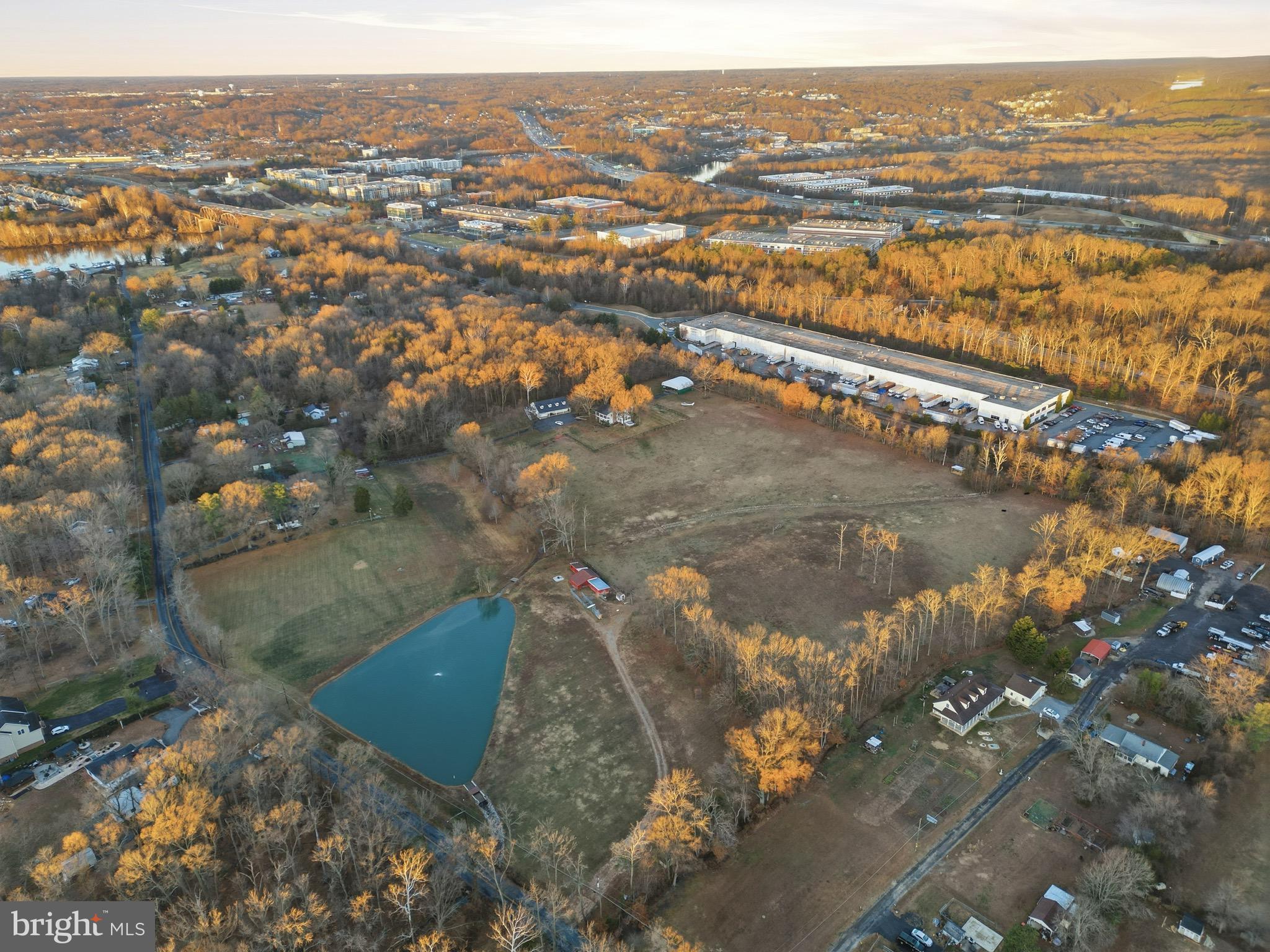 An extraordinarily  opportunity, this 21-acre luxury estate is zoned for both residential and agricultural use, offering unmatched flexibility for discerning end-users and sophisticated investors. The property features three existing farmhomes, thoughtfully positioned across expansive, picturesque acreage—allowing for immediate use while preserving exceptional long-term potential.

Ideal for a private or multi-generational compound, equestrian estate, vineyard or agricultural pursuits, or a strategic residential investment, this offering seamlessly combines scale, privacy, and zoning versatility—assets increasingly difficult to secure in Northern Virginia.

The serene, estate-like setting is complemented by exceptional accessibility, located just minutes from the Fairfax Yacht Club marina, the Occoquan River, and major transportation corridors serving Northern Virginia and Washington, D.C. The existing residences offer flexibility for rental income, staff housing, or transitional living while future enhancements or redevelopment are thoughtfully planned.