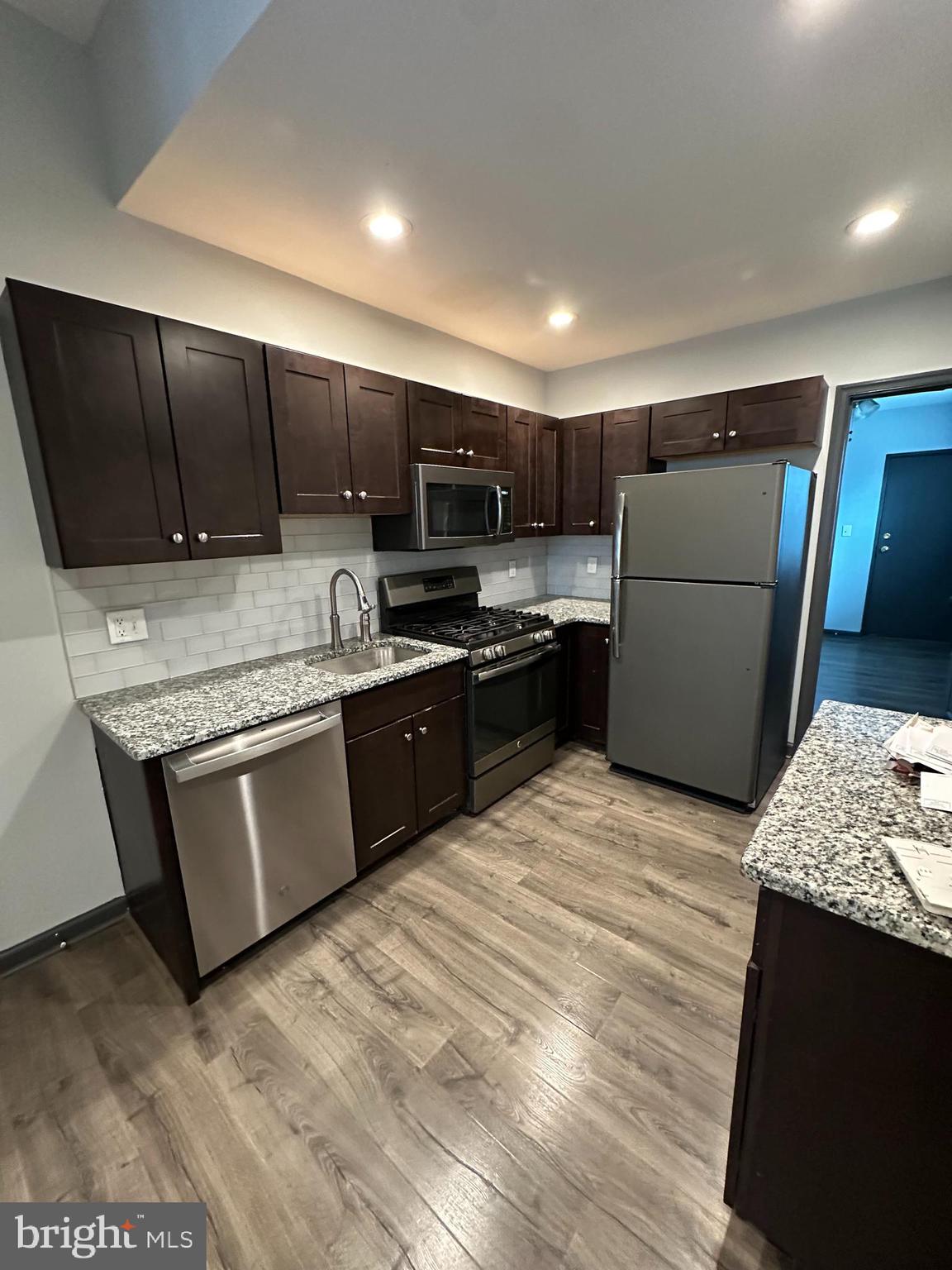 Investors Dream.  Currently rented through 2027 school year to Temple Students.  Welcome to 1819 N 19th Street.  This 5 bedroom house was totally renovated from top to bottom in 2018.  Features newer kitchen w/granite and stainless steel appliances, (2) new full baths, laminate floors throughout, all new electric, hvac and plumbing, newer windows, new drywall, doors, trim & baseboards, large unfinished basement with newer concrete and with washer & dryer, small fenced in yard with newer concrete.  Note this house can be purchased as a package with 1823 N 19th Street, which is also rented.