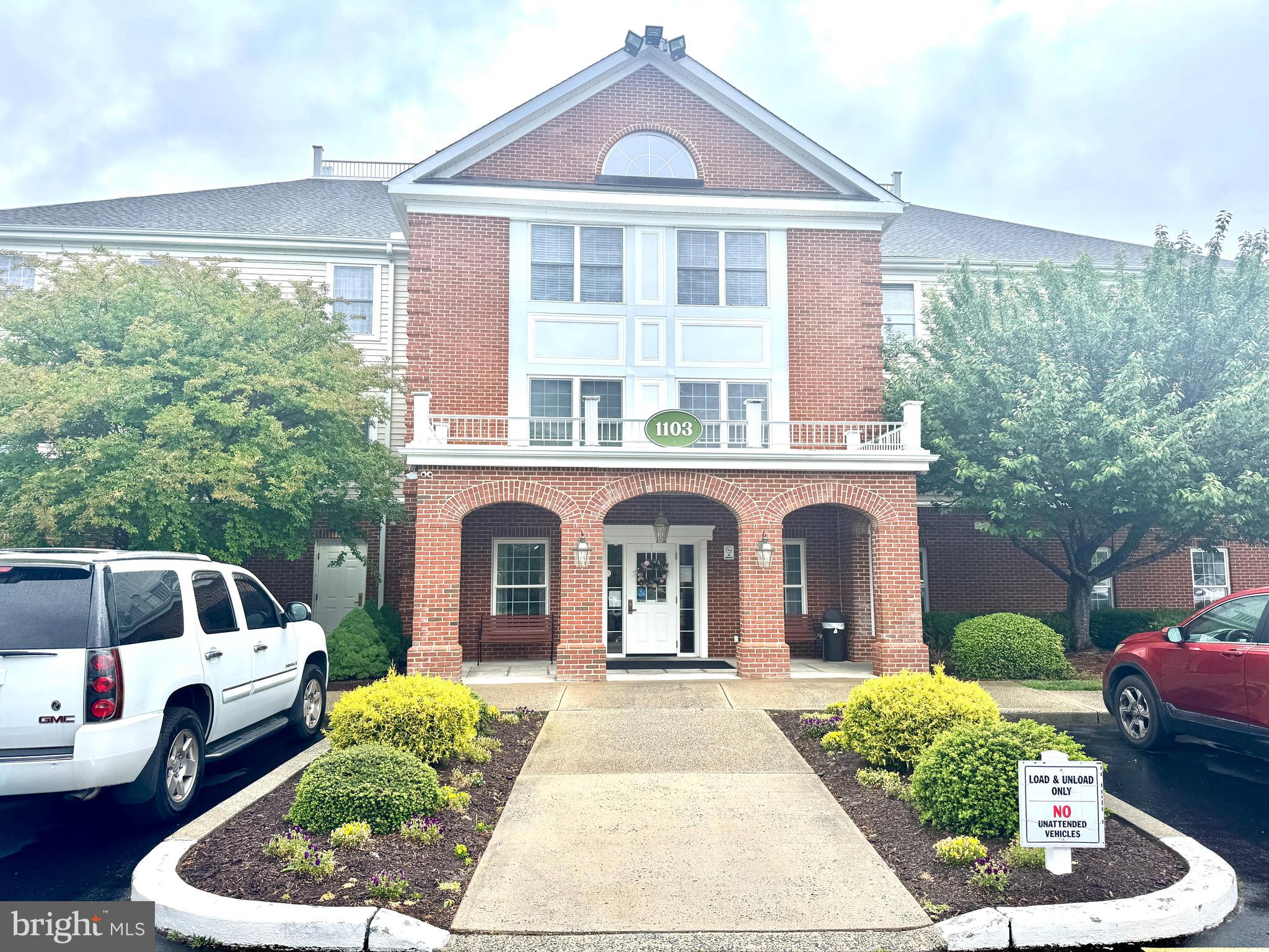 Desirable garden-level Oxford floorplan overlooking a beautifully landscaped courtyard with pond, fountain and walking paths. This inviting unit features an open living area connected to the kitchen, spacious primary suite, powder room, and a flexible office/den or guest room. Enjoy easy outdoor access, perfect for pet owners. Located in the amenity rich Mallard Landing community offering dining, activities and social events for active seniors. $2,000 flooring allowance.