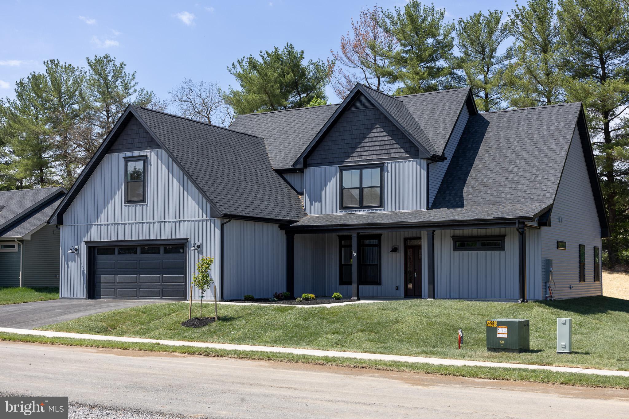 INTRODUCING “The Boulder” – a brand new floorplan built by Panhandle Homes of Berkeley County!  Construction is complete - MOVE IN READY!! The pictures are of the actual home, schedule a tour today.  Take advantage of the upgrades the builder included in this home and be one of the very first residents in “Meadow Crest” - a brand new subdivision in the Spring Mills area.  This floor plan has everything you need on the main level, with plenty of guest/flex space upstairs.  
The Owners Suite is on the MAIN LEVEL and has a luxury bathroom with two separate vanities, ceramic tile shower, private water closet and a HUGE walk-in closet.  The gourmet kitchen has a large, sit at island – perfect for everyday living and entertaining, a walk-in pantry and tons of cabinetry.  There is a dining/flex area off of the great room with wooden posts that match your stained front entry door.  The foyer has a media closet for your router with all your ethernet connections throughout the home hardwired back to.  The entry hall when you enter the home from the garage has a powder room, laundry room with a linen closet and wide stairs going to the 2nd level.  
Upstairs you’ll find a spacious landing area, 2 large secondary bedrooms - BOTH bedrooms with walk in closets, a full bathroom with a double bowl vanity, a linen closet plus a 16’x18’ unfinished bonus room – prepped to be finished in the future, or great left as-is for storage.
The oversized 600 sq ft garage comes with a smart opener, external keypad and large mechanical closet.  Outside you will find covered front (279 sq ft) & rear (220 sq ft) porches with PLENTY of space for outdoor furniture.  This home backs a tree line and has no neighbors directly behind you.