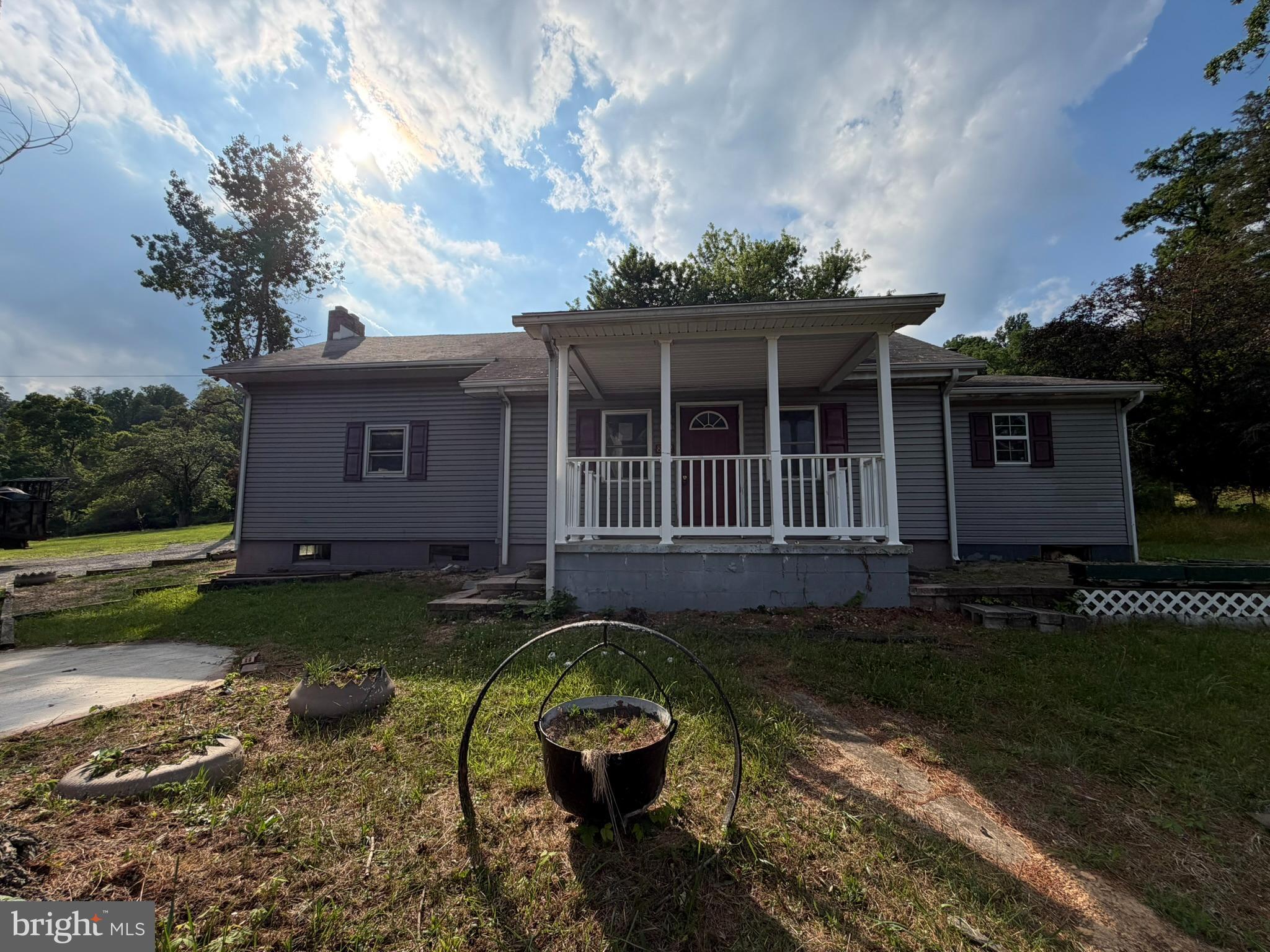 Charming, unique and private home on a very quiet 2+ acres is a great starter home or a weekend retreat. The main level features an open layout with endless possibilities to build additional bedrooms or to change the layout to your likings.  Lots of windows allow for natural lighting throughout the home. The upper level is very ample and offers lots of space and potentially 2 bedrooms. There is a separate laundry room, family room, large kitchen and an enclosed porch. The full basement is perfect for storage or workshop. The house is minutes from downtown Emmitsburg & Route 15 but also borders many acres owned by The Town of Emmitsburg and is also within 2 miles of Mary's College. A number of recreational centers and parks are also in close proximity, including Liberty Mountain resort, Catoctin Mountain Park, Emmitsburg Watershed Trails, Rainbow Lake, and Cunningham Falls State Park.