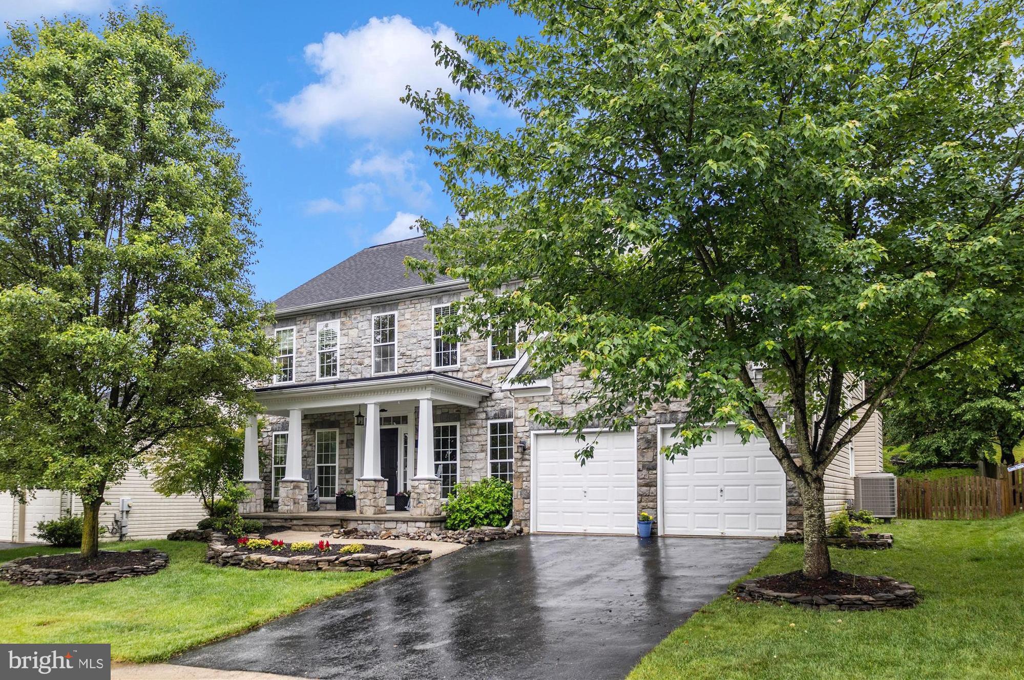 Welcome to this beautifully upgraded 5-bedroom, 3.5-bath home in the Greenview Subdivision. From the charming stone front exterior to the cozy wood-adorned veranda at the back, this house truly is a craftsman’s dream. The spacious open kitchen features gorgeous granite counters, a stylish slate-tile floor, and stainless-steel appliances—perfect for hosting family and friends. Over $100,000 was invested in upgrades, including charming wainscoting in the first-floor living and dining rooms, fresh trim on all the windows, elegant crown molding, a finished basement with a new full bath, a theater room, and a versatile space that could become a 6th bedroom with a built-in Murphy bed. The main family room boasts a lovely coffered ceiling, while the master bedroom features a dramatic cathedral ceiling. You'll also find new carpeting and beautiful hardwood stairs, custom built-in shelving and cabinets , and upgraded lighting and fixtures add  warmth all around.  Enjoy plenty of privacy with an open area behind the home, and stroll along walking paths that lead to the HOA-maintained tennis courts, basketball courts, and playground. Plus, you can walk to the brand-new Linganore Creek Elementary School, scheduled to open in August. All of this is just minutes from Frederick City, with easy access to I-70. Welcome to your new home!