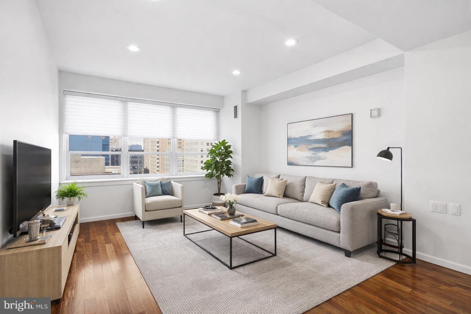 Perched above the energy of Center City, this sun-drenched and meticulously maintained condo at the Aria offers the perfect blend of comfort, style, and convenience. Beautiful hardwood floors flow throughout the open-concept living space, creating an inviting layout ideal for both everyday living and entertaining.

The kitchen is thoughtfully designed with GE Profile stainless steel appliances, granite countertops, under-cabinet lighting, a tile backsplash, and a generous breakfast bar overlooking the living area. The spacious bedroom provides ample storage and features plush carpeting for added comfort. Custom window shades and an in-unit Bosch washer and dryer add to the home’s everyday ease.

Residents enjoy the exceptional lifestyle offered at The Aria, a stunning Art Deco, full-service condominium known for its attentive staff and premier amenities. The building features 24-hour concierge service, a resident lounge with billiards and dining areas, a TV lounge, catering kitchen, pet spa, guest suite for overnight visitors, and a state-of-the-art fitness center with yoga room.

Ideally located in the heart of Center City, the Aria is just steps from Rittenhouse Square and within easy walking distance of Suburban Station, Philadelphia City Hall, and the Market-East transit hub—surrounded by some of the city’s best dining, shopping, and theater.

This is city living at its finest—combining historic elegance, modern amenities, and an unbeatable location.