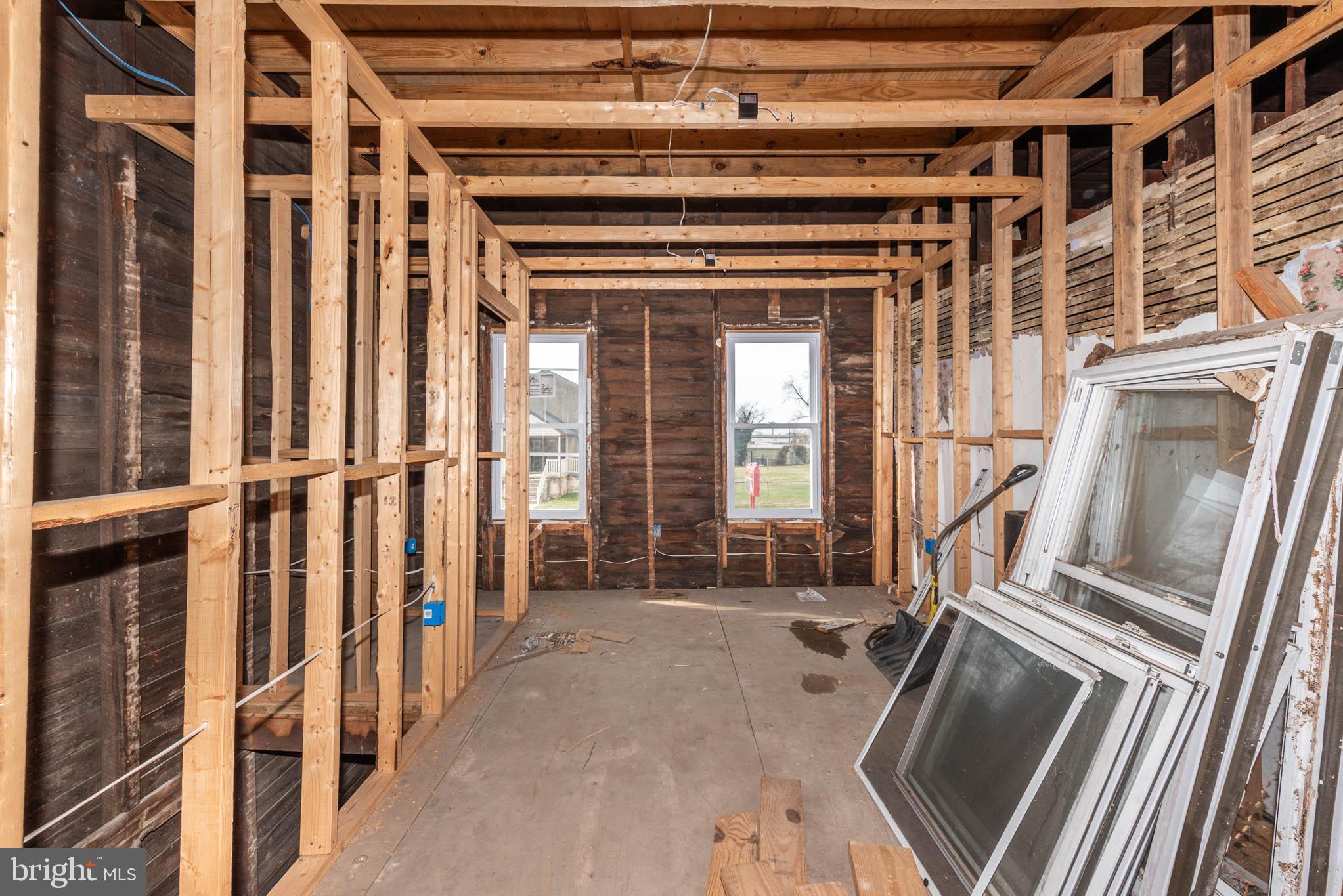 DEVELOPMENT OPPORTUNITY!  Semi-Detached home that has been framed that is ready for an investor to come in and finish!  Potential for 3 finished levels and already has off street parking.  Located close to Johns Hopkins University, Baltimore Museum of Art, and Clifton Park!  Sold As-Is