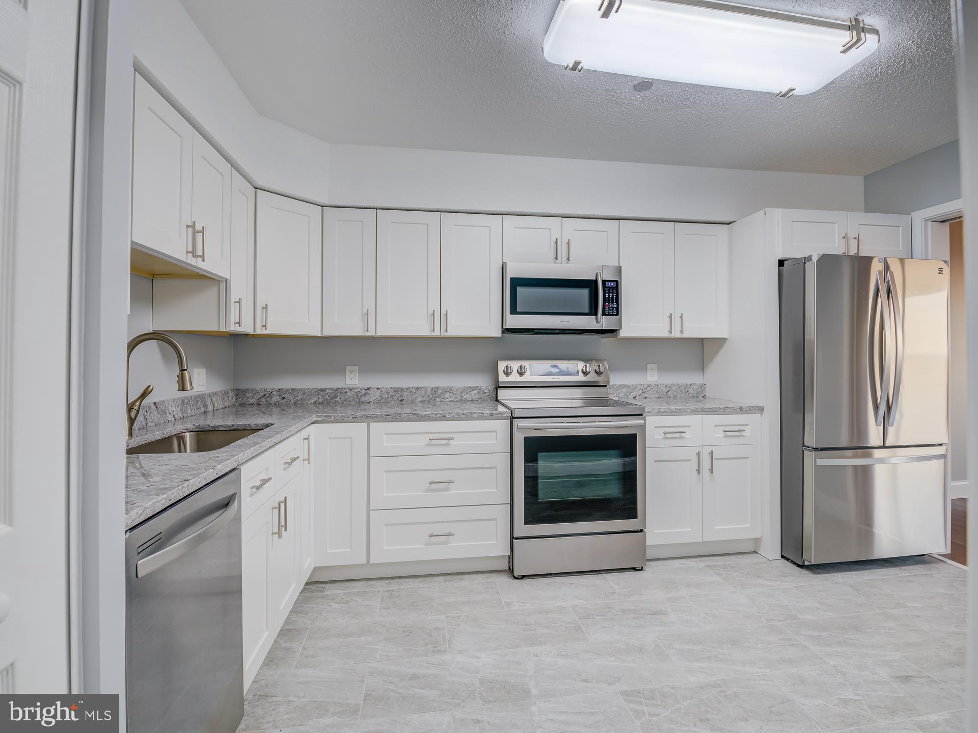 Stunningly Renovated from Top to Bottom Penthouse Condo Offering Panoramic Views of Old Town, the Masonic Temple, MGM, and the Wilson Bridge. This Bright and Sunlit Residence is bathed in natural light throughout the year. The condo is freshly painted: neutral color “Crushed Ice” (Behr Marquee) including “Ultra White” ceilings throughout! New "CARRIER" HVAC unit in the utility closet, Enjoy 'J&K' Kitchen cabinetry with contemporary brushed hardware, Granite Countertops, SS Kitchen appliances and Deep Sink and Faucet. You'll love this Wide Plank Wood Flooring and 6-Panel Bifold doors and wide plank wood floors complemented by 5.5-inch baseboards that run throughout. Fully renovated Bathrooms w/ “Maximo Vittorio Bianco” Polished Porcelain Tile. "Kohler" toilets in both bathrooms & "Kohler" shower fixtures w/ a new LED light above the tub. “JEK” vanities & ‘Calacatta Laza’ quartz countertops in both bathrooms & ceiling LED light fixtures. The building offers an array of amenities, including a pool, exercise rooms, saunas, steam rooms, billiards, party room, and 24-hour security and front desk service, along with garage parking. Its prime location places you just minutes away from Shirlington, BRAC, Pentagon City, Amazon HQ2, the new West Alex development, Ballston Quarter, Old Town, downtown DC, and major transportation routes such as 395, 495, and the Ronald Reagan National Airport. Nestled in the heart of Northern Virginia, it provides a convenient and tranquil lifestyle. Skyline, conceived by developer Charles E. Smith in the early 1970s, is located in the historic Bailey's Crossroads area of Falls Church. Here, you'll find everything you need for dining, shopping, working, playing, and living—all within a short stroll from your doorstep. Enjoy an effortless commute to DC, the Pentagon, and all corners of Northern Virginia. Welcome to a world of Luxury, Location, and Carefree Living!"