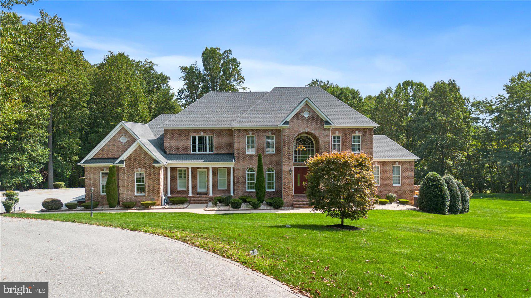 Welcome to 15 Batterbrook Court, a magnificent estate nestled in the serene landscape of Kingsville, MD. Set on 4.63 acres of meticulously maintained grounds, this property offers a private oasis complete with a heated in-ground pool and a custom hardscaped sitting area featuring a built-in fire pit—ideal for relaxing or entertaining.

As you step into this luxurious all-brick colonial with over 8300 sqft of finished living space, you'll be immediately impressed by the grand 2-story foyer with gleaming marble floors. The main level unfolds into an expansive 2-story family room, enhanced with hardwood floors and a cozy wood-burning fireplace, creating a warm and inviting atmosphere surrounded by crown and box moldings that exude elegance and sophistication throughout. The heart of the home is the oversized kitchen, designed for both style and functionality. It boasts a large center island with granite countertops, brand new high-end appliances, and a butler's pantry. Adjacent to the kitchen is a bright breakfast room offering stunning views of the pool area. Step outside onto the spacious deck from the sunroom or den to enjoy the tranquility of the estate-like setting. 

The upper level is equally impressive, featuring four generously sized bedrooms with brand-new carpeting and three full bathrooms. The primary suite is a sanctuary of luxury, complete with a tray ceiling, a sitting room, wet bar and a gorgeous bathroom. Every room on this level has been freshly painted, ensuring a move-in-ready experience.

The lower level is an entertainer’s dream. It includes a fifth bedroom suite with a walkout to the patio and pool area, offering guests a private retreat. The large recreation room is perfect for gatherings, featuring a full bar, a freezer, a large refrigerator, and a wine room for the connoisseur. A second wood-burning fireplace adds to the ambiance, creating an ideal space for both relaxation and entertainment. A second full bath with a steam shower also exists on the lower level.

Additional highlights of this exceptional property include a massive 4-car garage with brand new doors, an electric gate for added security and privacy, and a multiple-car driveway to accommodate guests. Recent updates enhance the home's value and efficiency, including a new roof, gutters, and downspouts installed in 2023, new HVAC systems added in 2022/2023, and 2 new water heaters from 2020. The 40kw generator ensures uninterrupted comfort regardless of the weather.

15 Batterbrook Court is more than just a home; it’s a luxurious retreat that offers an unparalleled lifestyle in a stunning, secluded setting. Don't miss this rare opportunity to own a piece of Kingsville’s finest real estate!