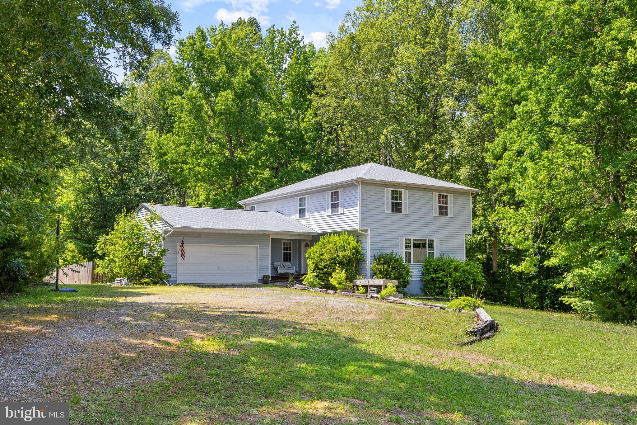 Welcome to peaceful country living just minutes from Lake Anna! Situated on 1.54 acres, this charming 4-bedroom, 2.5-bath home offers the perfect blend of comfort, privacy, and rural charm. With plenty of room for gardening, animals, chickens, or simply enjoying the outdoors, the possibilities are endless.

Inside, you'll find generous living spaces designed for everyday living and entertaining. Step outside to the spacious rear deck, the perfect place to relax with a cup of coffee in the morning, unwind after a long day, or enjoy the peaceful country views.

A special bonus is the adorable local farm stand just across the street, offering fresh eggs, meats, and other local favorites right at your fingertips. Whether you're dreaming of a hobby farm, homestead lifestyle, or simply more room to spread out, this property delivers the space and freedom you've been looking for.

Conveniently located just minutes from Lake Anna's boating, fishing, dining, and recreation opportunities, this property combines the best of country living with easy access to everything the area has to offer. Come experience the charm, character, and endless potential of this unique country retreat!