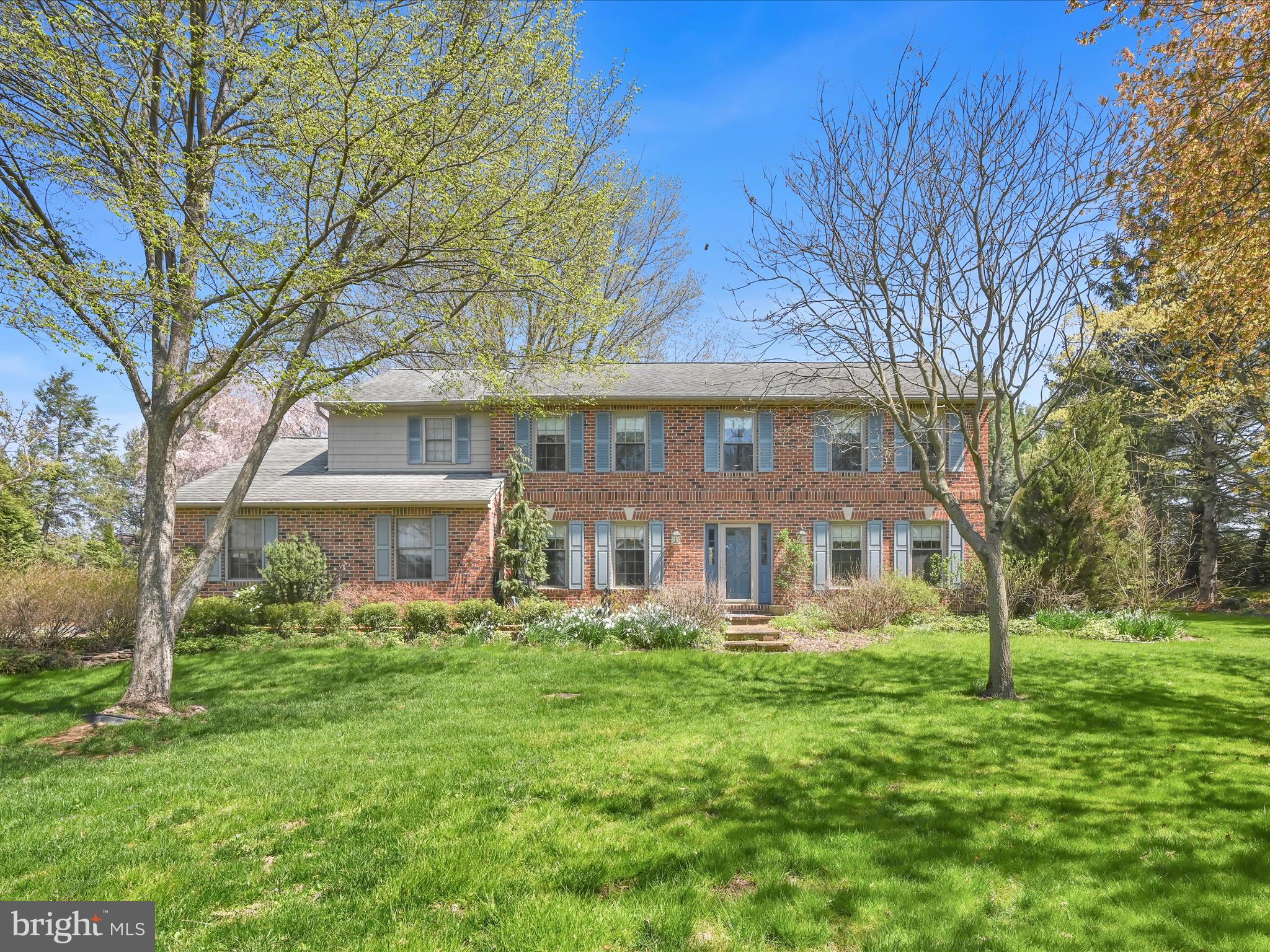 This exceptional property offers the perfect blend of peaceful rural living and convenient access to the vibrant amenities of Lancaster City. Sitting on nearly an acre of beautifully maintained land, this home has been lovingly cared for both inside and out. With over 3,000 square feet of thoughtfully designed living space, it provides a comfortable and inviting layout ideal for modern lifestyles. As you step inside, you'll be greeted by the warmth of Australian Cypress floors, setting the tone for the elegant details found throughout.  The recently upgraded kitchen cabinetry enhances organization with innovative storage components, while a spacious mudroom/laundry room seamlessly connects the home to the attached garage. The expanded family room, just off the kitchen, offers breathtaking views of the picturesque backyard, a true oasis for relaxation. Upstairs, four generously sized bedrooms await, including a luxurious primary suite that serves as a true retreat, boasting three walk-in closets and a spa-like en suite bathroom.  Throughout the home, brand-new high quality replacement windows allow natural light to pour in, enhancing every space. The finished basement provides an additional area to unwind, while still offering ample storage options. Step outside to explore the stunning grounds, which have been featured in multiple publications. Meander along garden paths lined with low-maintenance plantings, admire the biologically filtered pond, or simply take a moment to relax on one of two patios or swings, surrounded by the beauty of a preserved horse farm and serene nature.  In addition to the attached oversized two-car garage, a separate one-car detached garage serves as a versatile space for storage or a workshop. A truly one-of-a-kind property, this home is a rare opportunity to experience tranquility and beauty while remaining close to everything you need. Don't miss your chance to make this extraordinary property your own!