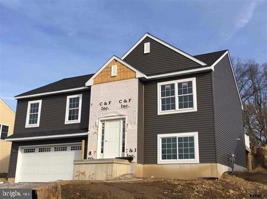 Conestoga Bi Level, Under Construction. This home features 3 bdrms & 2 full baths on the main floor along with kitchen, dining area & living room all under cathedral ceiling. Walk down stairs to a finished LL that could be used as den or 4th bdrm, accompanied by powder room & laundry. House plans under documents. Other lots & house plans available.
