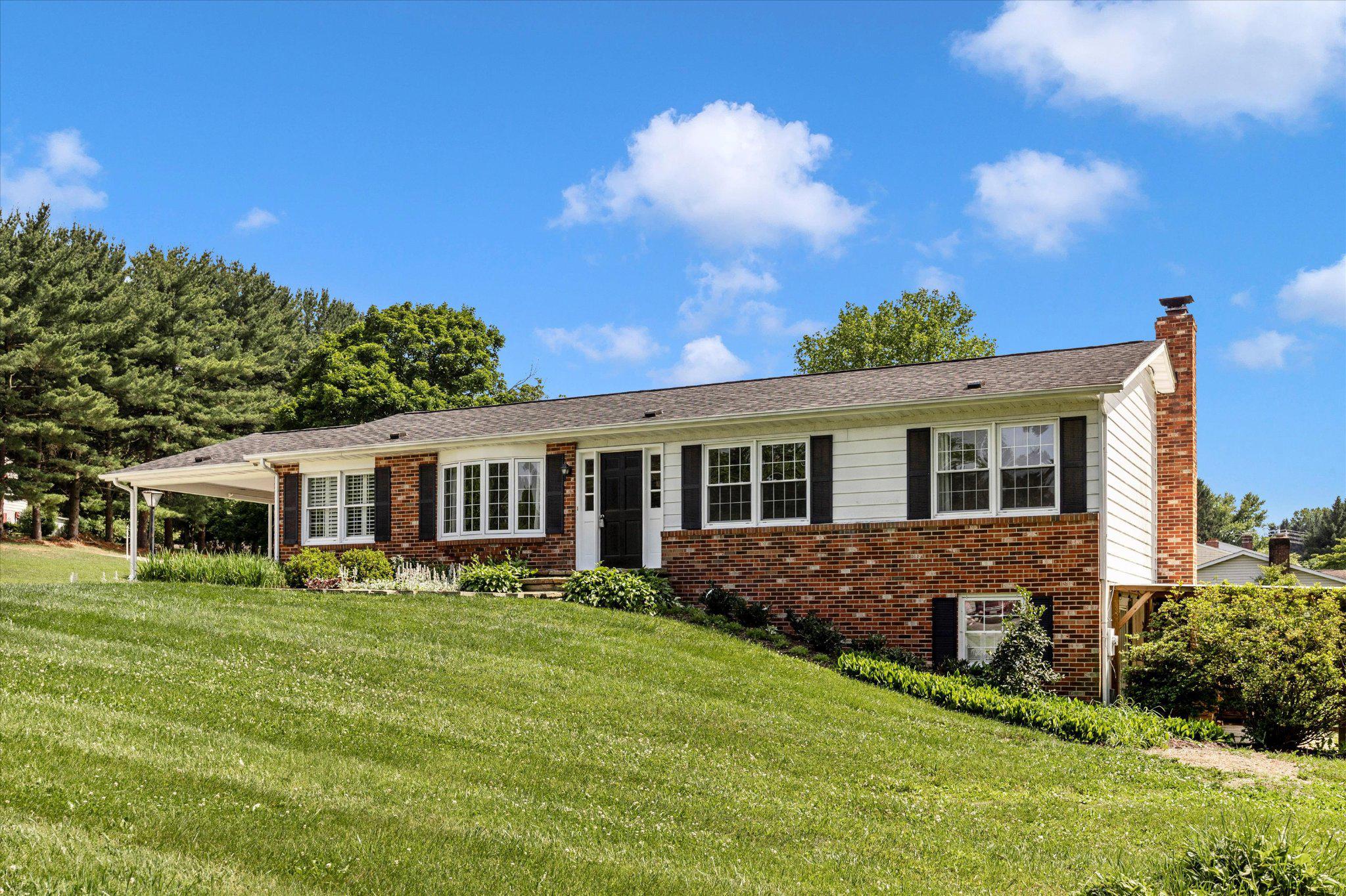 SOLID HOME ON LARGE LOT - HIGHLY DESIRABLE MT AIRY, FREDERICK COUNTY - NO HOA
Solid 3 BD, 2.5 BA family home on almost 1 acre. Move-in ready with refinished hardwood floors, freshly paint on main level; unlike many homes of this era, 5811 Corporal Jones lives and feels expansive, flooded with light from large windows (including large bay window in living room), custom plantation shutters in dining room, 8’ ceilings, open-concept kitchen (granite counters, tile backsplash) with newer stainless steel appliances)/breakfast area opening to deck (with retractable awning) and to endless outdoor living areas, including 3 patios, firepit, outdoor shower/dog washing station, raised planting beds, sheds and more. Primary bedroom has ensuite. Spacious, partially finished walk-out basement is ready for you to finish according to your needs and lifestyle: workshop, office, family room, craft room, exercise room, add a bedroom. Basement includes a half-bath w/rough-in for shower, fireplace updated with insulated stainless-steel liner and newer wood stove (wood conveys), and epoxied floors. Property includes invisible fence - and chickens are allowed! 

In addition to the 5,500sf rebar reinforced parking pad designed for parking heavy equipment and/or building a detached garage or equipment shed, property features “York Stone” patios and walkways set on rebar reinforced concrete.  Imported from Great Britain and highly desirable, Yorkstone (a tightly grained sedimentary rock consisting of quarts, mica, feldspar, clay and iron oxides) has been mined since the Middle Ages and is known for its strength, versatility, and durability (and slip resistance). Environmentally-friendly reclaimed Yorkstone is one of the most desired paving options on the market. 

Updates include: 2026: Radon Mitigation System; 2024: New Washer & Dryer, New pressure tank for well; replaced back baffle and line pipe for septic. 2021: Attic insulated, new fridge, dishwasher, oven range and microwave. 2017: New Roof. 2016 Landscaping, including privacy screening arborvitae. With NO HOA, homes in this Frederick County neighborhood are rarely available.  Corporal Jones Court is a dead-end community with only 21 well maintained homes on large, gently rolling lots, each home strategically placed for privacy and views. Convenient to I-70 and Routes 27 and 75, convenient to amenities in Mt Airy, New Market, Urbana, Frederick and Damascus, and easy commutes to DC, the 270-Biotech Corridor, Fort Detrick, Fort Meade, Annapolis Junction, Columbia and Baltimore.