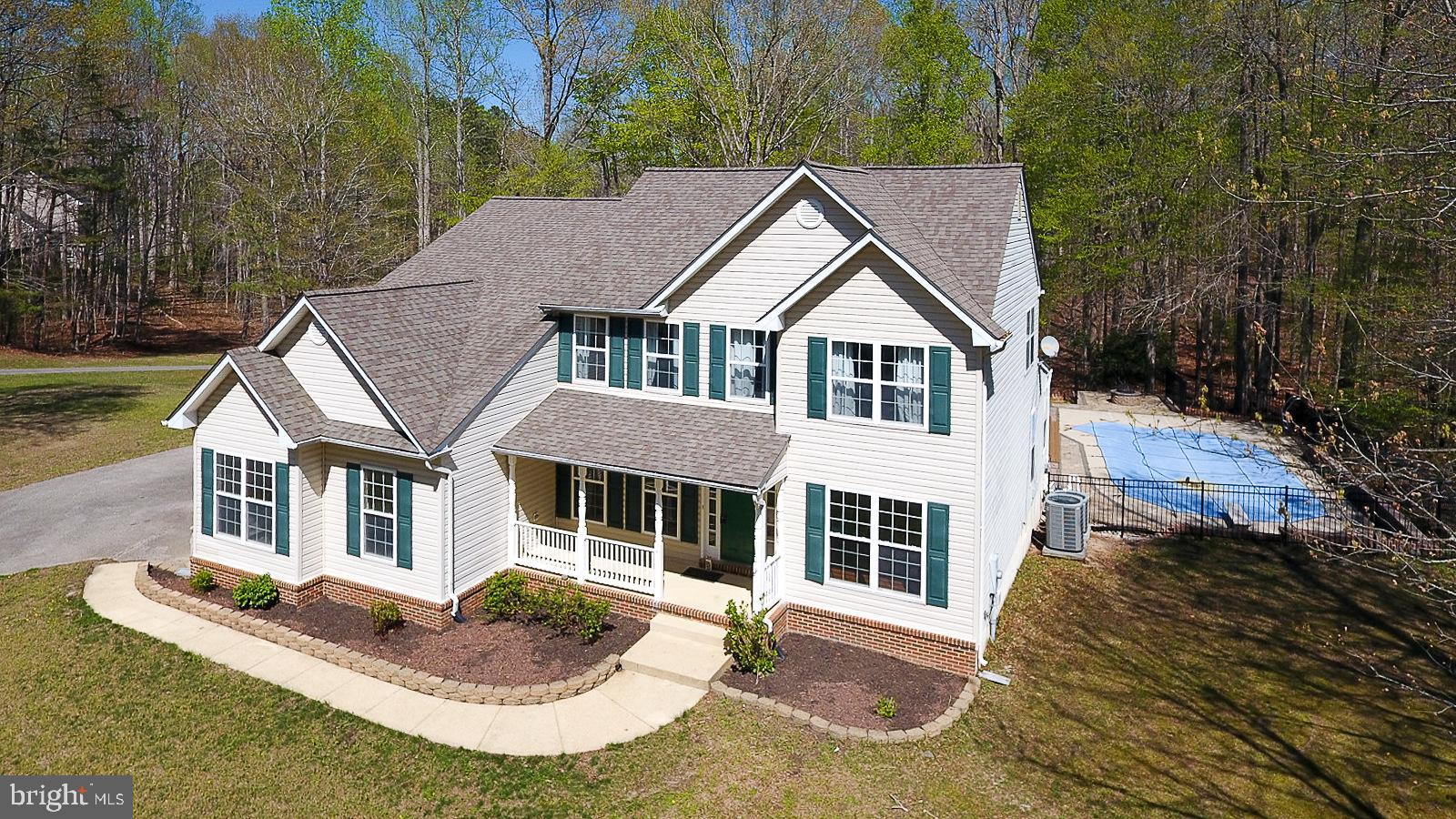 Stunning & Spacious Home with In-Ground Pool & In-Law Suite!

Welcome to 28024 Pastor Court—a remarkable home offering extra-large living spaces, luxurious features, and an incredible outdoor retreat in the sought-after Persimmon Hills community.

This 5-bedroom, 5.5-bathroom home is designed for both comfort and elegance, boasting 9-foot ceilings, crown molding, wainscoting, and chair rail accents throughout. The main-level private suite provides convenience, while the super spacious primary bedroom includes an enormous walk-in closet for all your storage needs.

The gourmet kitchen is a chef’s dream, featuring granite countertops, a double oven, an oversized pantry, abundant cabinetry, a stylish tile backsplash, and under-cabinet lighting. The finished basement offers a second kitchen and an in-law suite, making it perfect for extended family or guests.

Step outside to your own private oasis, where a massive composite deck overlooks the in-ground pool and cozy fire pit—ideal for entertaining or relaxing in peace. Additional highlights include a new roof (2019), new HVAC, a two-car garage, and public water.

Nestled in a quiet setting yet incredibly convenient, this home is just 4 miles from commuter services to Washington, D.C., and offers easy access to NAS Patuxent River.

Don’t miss the opportunity to own this one-of-a-kind home—schedule your showing today!