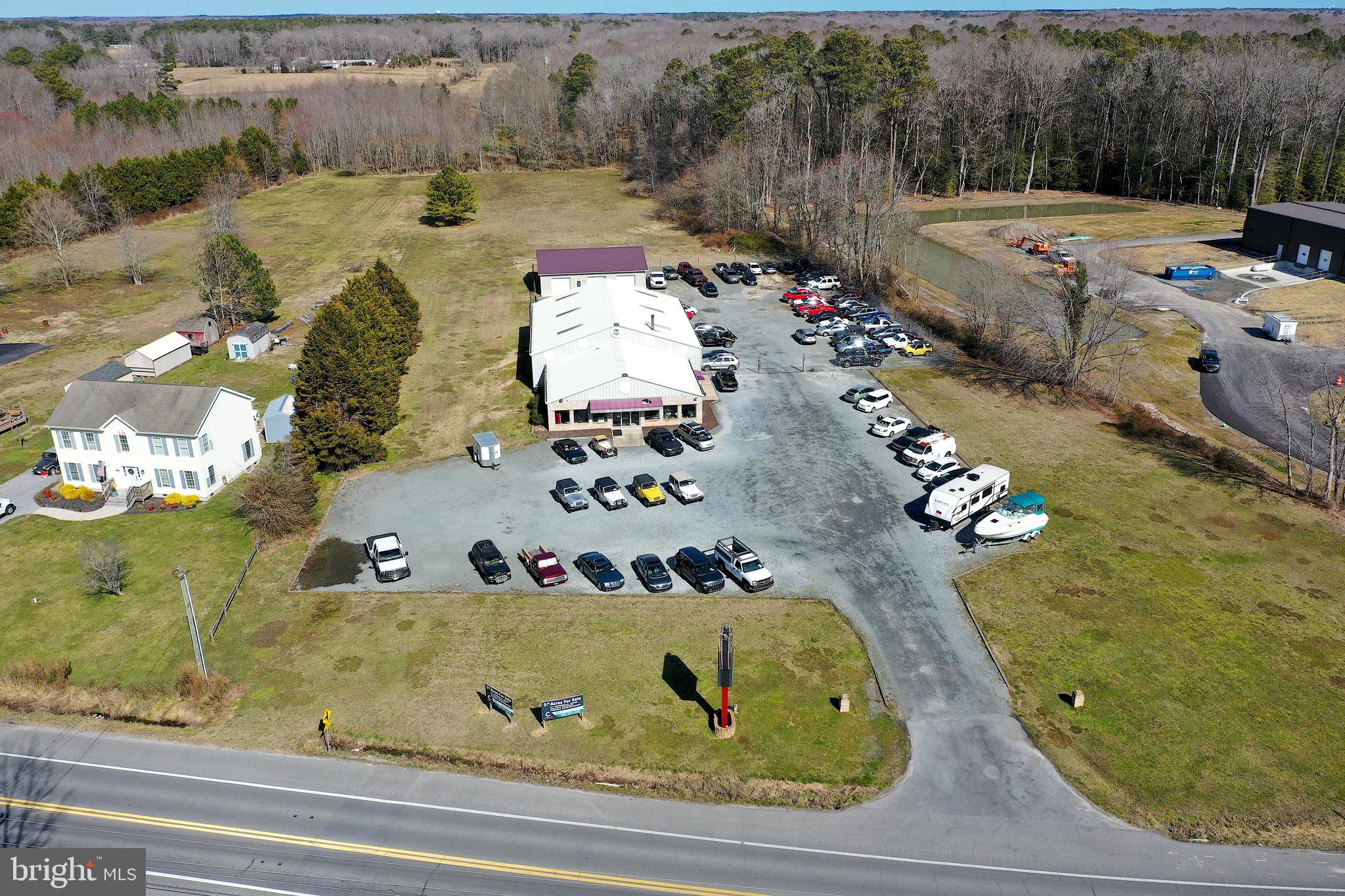 Prime Commercial location with 5.44 acres that is zoned C-1. Currently used as a car dealership and service center with 2 beautiful buildings. Located in Sussex county with low taxes and close to Delaware and Maryland beaches. Tons of potential with this location to be used for redevelopment, its current use or bring you own ideas to this outstanding property.
