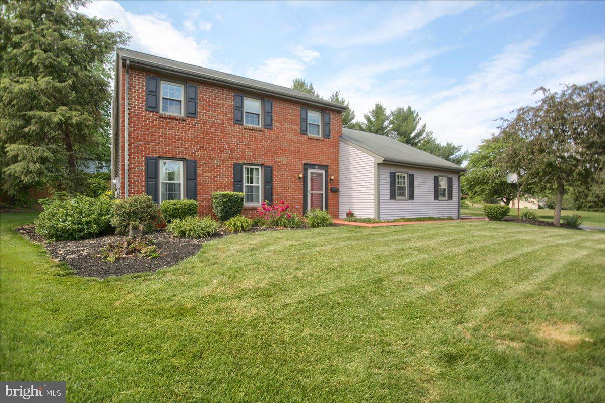 Don't miss this bright and airy 4 bedroom, 2.5 bath home with a 2 car garage located at the end of a peaceful cul de sac!  With over 1800 sq. ft. of living space, fresh paint, and new carpeting throughout, this home is ready for you to move right in.   A spacious, updated kitchen has ample cabinet space and is a pleasure to move around in or gather for meals.  Entertaining is a breeze with the formal dining room and living room combination located right off the kitchen.  If you've always wanted a wood fireplace, you've got one, and located off the family room is a three-seasons room.  Upstairs are your bedrooms with a remodeled master bathroom.  Relax on the back patio and enjoy the fresh air.  Home is located near major roads and highways for easy access.  One year home warranty included.  Schedule your showing today!