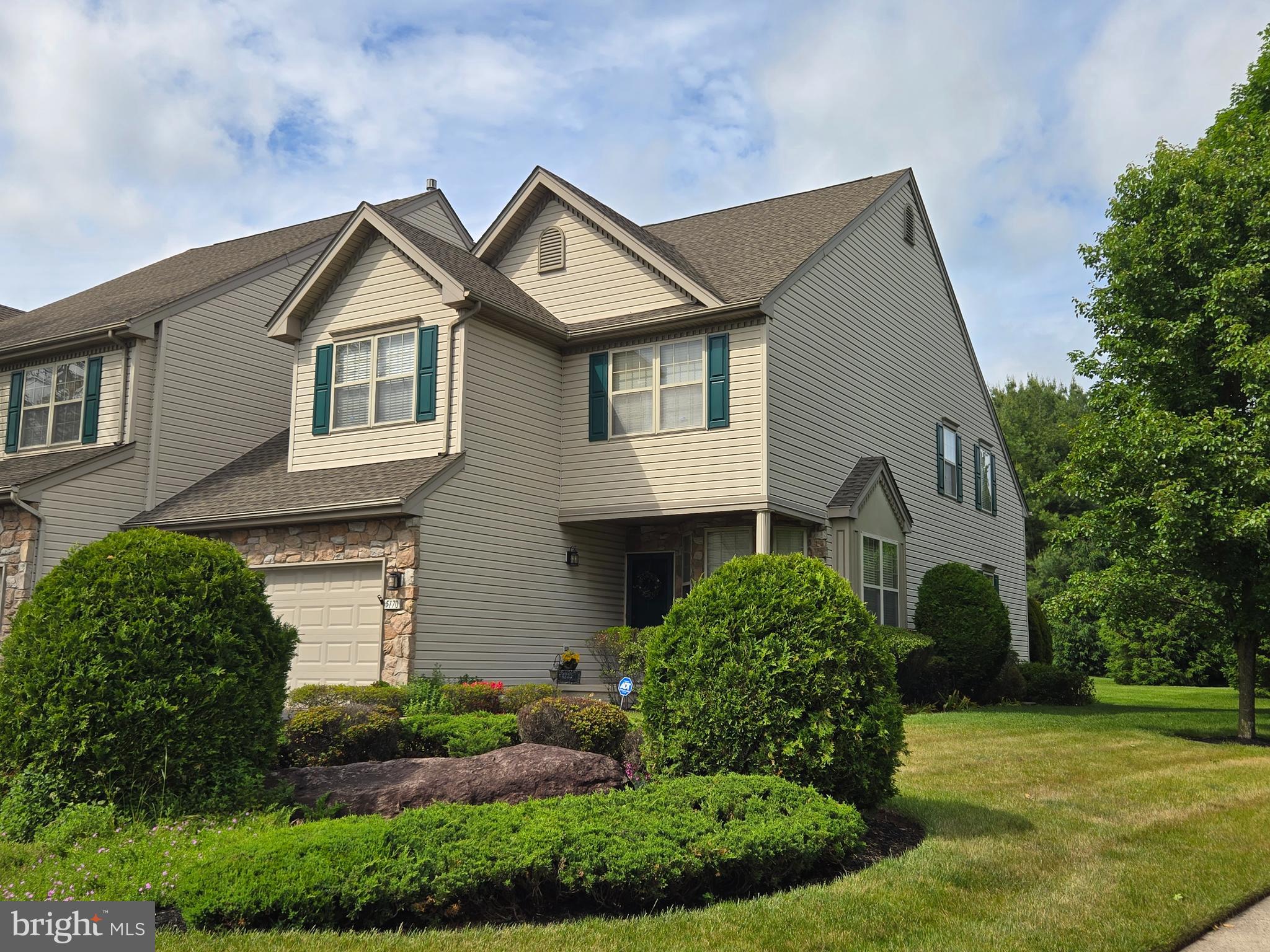 Welcome home to this 3-bedroom, 2.5-bath end unit townhome in the desirable Fireside Development in Buckingham Township. Boasting an impressive 3,203 square feet of main living space plus an additional 778 square feet of finished basement, this home offers the space and functionality today's buyers are seeking.

Step inside to experience the dramatic two-story family room, where soaring ceilings and a cozy fireplace create an inviting focal point perfect for gathering with family and friends. The open floor plan flows seamlessly throughout the main level, offering both grandeur and warmth in equal measure.
With three generous bedrooms and 2.5 well-appointed bathrooms, this home provides comfortable accommodations for the entire family. The thoughtful layout maximizes every inch of the home's expansive square footage.

The finished basement is a true bonus, adding valuable living space that can serve as a recreation room, home theater, home gym, office, or playroom—the possibilities are endless with an extra 778 square feet at your disposal.

As an end unit, this townhome offers additional natural light, enhanced privacy, and the convenience of an attached garage—a rare and highly sought-after feature in townhome living. No more scraping ice off your windshield or unloading groceries in the rain!

Located in the prestigious Fireside development and the heart of Buckingham, you'll enjoy proximity to top-rated Central Bucks schools, charming downtown shops and restaurants in Doylestown Boro, parks, and convenient access to major routes for easy commuting.

This is your opportunity to own a spacious, well-designed end unit townhome with nearly 4,000 total square feet in one of Bucks County's most desirable communities. Schedule your private showing today and experience all this exceptional home has to offer!