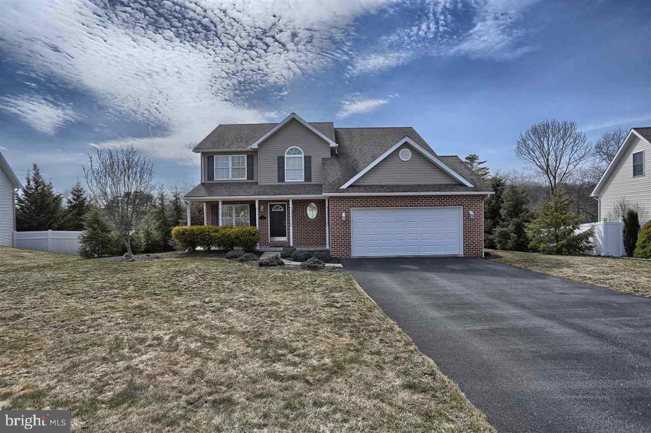 Meticulously maintained 4 or 5 BR, 2.5 Bath home, 5th BR could be home office. New carpeting in Family Rm and Master, new SS range and dishwasher in kitchen, family and sunroom area for entertaining family/friends with extra large Trex deck w/pergola overlooking private wooded backyard. Basement is prepped for finishing with plenty of storage shelves and roughed-in plumbing.  This home is better than new!