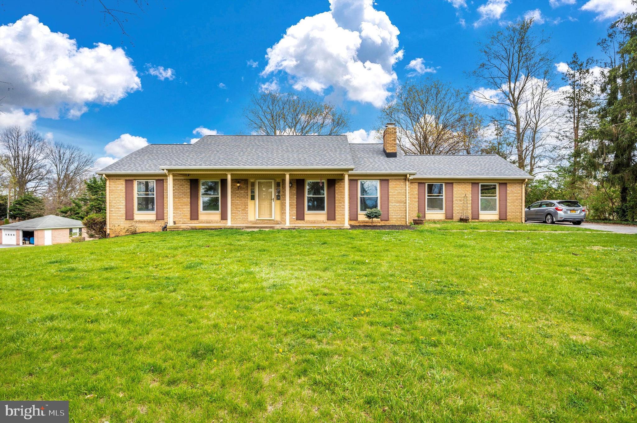 Welcome home to this sought after all-brick rancher on approximately ½ acre with beautiful farm views. This three bedroom, two full bathroom home features fresh neutral paint throughout, white kitchen with stainless steel appliances, new carpet in bedrooms, newer windows, LVP flooring, wood burning fireplace, newly renovated bathrooms, and main level laundry.  Entertain on the rear patio and in the spacious flat backyard.  Put your finishing touches on the basement with a family room and large storage room. Plenty of storage can be found in the walkup attic as well. This home also boasts a two car side loading garage with plenty of additional driveway space. Close to I-70 and I-81 as well as shopping and dining. This one won’t last long. Schedule your showing today!