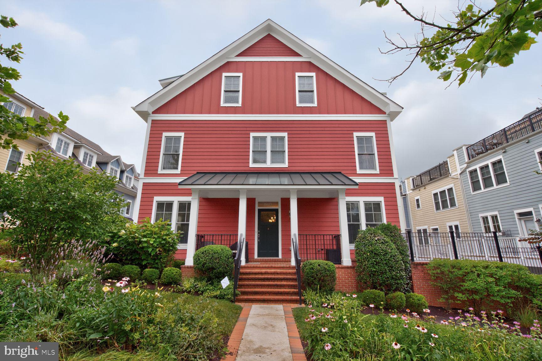 Rarely available end-unit townhome in Chelsea Heights, EYA's award-winning LEED-certified community built in 2015/2016. This sought-after Bergman II model offers 2,186 finished square feet, 3 bedrooms, a loft, 3.5 baths, a covered front porch, private rooftop terrace, and an attached two-car garage. One of only three Bergman floor plans featuring a front porch entrance on the long side of the home, it offers the curb appeal and feel of a single-family residence.

The main level features an open-concept layout with 9-foot ceilings, hardwood flooring, and abundant natural light from windows on three sides. The gourmet kitchen is appointed with stainless steel appliances, granite countertops, a large center island with generous storage, a pantry, and a cozy sitting area. The adjoining dining area flows seamlessly into the spacious living room, while a powder room and coat closet complete the level.

The second floor includes the spacious primary suite with two walk-in closets and a luxurious bath featuring a double vanity and oversized walk-in shower. A second bedroom, full hall bath, and convenient laundry closet with front-loading washer and dryer complete this level. Brand-new carpeting has been installed throughout all upstairs bedrooms and the lower level, providing a fresh, move-in-ready feel.

The top floor offers exceptional flexibility with a third bedroom, full bath, and an inviting loft featuring hardwood flooring and a linear gas fireplace. Sliding glass doors lead to the private rooftop terrace with new (2025) Duradek waterproof vinyl decking, creating the perfect outdoor space for entertaining, relaxing, or enjoying evening sunsets.

The finished lower level provides an ideal family room, recreation room, home office, or fitness space and includes multiple storage closets. The attached rear-entry two-car garage features metal shelving for additional storage. Permit parking is available directly in front of the home, with additional visitor parking conveniently located nearby.

Additional highlights include three-zone heating and cooling, custom window blinds throughout, and a Trinity security system.

Chelsea Heights offers a peaceful, park-like setting just moments from vibrant Downtown Silver Spring. Enjoy easy access to Whole Foods, Veterans Plaza, AFI Silver Theatre, The Fillmore, the Silver Spring Civic Building, public library, and an impressive selection of restaurants and shops. Ellsworth Urban Park is directly across the street, while Sligo Creek Elementary is just blocks away. The Silver Spring Metro and MARC stations are less than one mile away, I-495 is approximately five minutes away, and the future Purple Line stations are only a few blocks from the community.