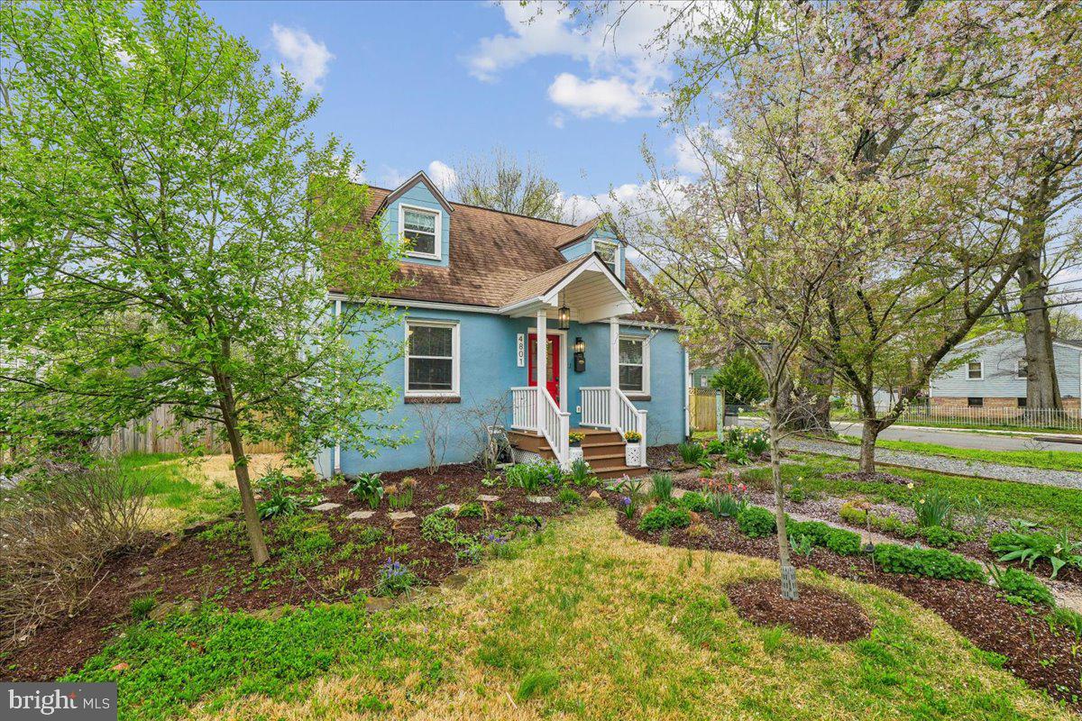 Welcome to this beautifully maintained and updated 3-bedroom, 2-bathroom Cape Cod, perfectly situated on a spacious corner lot in the sought-after Riverdale Park community. Built in 1950 and thoughtfully expanded, this home seamlessly blends classic charm with modern conveniences!    Visit this Charming & Updated Cape-cod on Saturday at the Open House 12-2!   A cathedral ceiling family room was added in 2018 and located off of the kitchen featuring a gas fireplace and laundry room with double doors, accessing fenced, backyard and huge deck! Fully fenced  with wood privacy fencing, large deck and yard for entertaining  and playtime! For your pets and children!  The front of the house, when you walk in, is a welcoming & open living room, with natural  light and updated windows throughout! The Gourmet galley kitchen has just been updated with new butcher block countertops in 2026, stainless steel appliances and double stainless steel sink. There is a special two pantry system that is original and deep closet space.  They open up  fully to allow access to both pantries without interference to the kitchen.  Rare for a home this age! The main level also features original and new wood floors throughout with two bedrooms and an updated, adorable, clean tiled  bathroom with full tub and bath. The upstairs en suite is incredible and feels like a resort boutique hotel!  Featuring plenty  of closet space, comfort and sophisticated Spa style bathroom with separate walk in closet.  Please see improvement list attached in documents for all updates! *Walk to many restaurants and shops in Old Town of Riverdale! Parks are surrounding this community and Whole Foods and New Town Center is less than 5 mins away.  10 minute drive to DC!  Don't Miss this one!