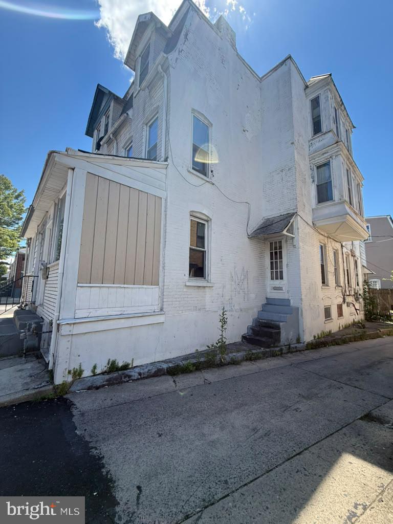 Step into a charming piece of history with this delightful 3-floors, 5-bedroom, 1.5-bathroom townhouse nestled in the heart of Allentown. This traditional home boasts timeless stucco exterior and a warm, inviting atmosphere that instantly feels like home. The spacious layout offers endless possibilities for personalization, with a full basement ready for your creative touch. Imagine cozy evenings in the living room, or hosting gatherings in the generous dining area. The well-appointed kitchen is perfect for culinary adventures, while the half bath adds convenience for guests. Enjoy the vibrant community of Allentown, where local shops and parks are just a stroll away. With no parking worries, you can embrace the ease of urban living. This home is not just a place to live; it's a canvas for your dreams. Don't miss the chance to make this charming townhouse your own!
