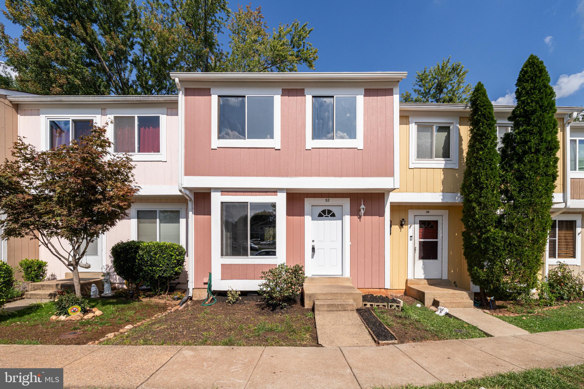 3-LEVEL TOWNHOUSE FOR THE PRICE OF A 2-LEVEL **** Welcome to your beautifully remodeled 3-level 4 bed 2 bath townhouse in the desirable Sugarland Run community! The upper level boasts 3 bedrooms with new carpet and a full bath, while the finished basement includes a 4th bedroom with a full bath. Upgrades: The HVAC  was replaced in 2018, and the Roof was replaced in 2021, and the Hot water Heater in 2021. **—new luxury plank flooring on the main level, new lighting fixtures, and freshly painted interiors. This home offers the utmost convenience for shopping and commuting, making it a perfect choice for modern living. Freshly Remodeled: Everything is newly updated, including a stunning kitchen with quartz countertops and stainless steel appliances. Both bathrooms were fully remodeled, ensuring comfort and style. Enjoy an open-concept living and dining area featuring hardwood floors and recessed lighting.  Step outside to a private fenced-in rear yard that backs to the common space, providing privacy. Enjoy your deck—perfect for outdoor entertaining! Take advantage of the incredible community amenities, including a pool and tot lots, all while being located in a private cul-de-sac. This charming townhouse is move-in ready, showcasing pride of ownership with many thoughtful upgrades. There are two owners parking tags and one guest parking tag (so parking in any space is allowed with a tag). Don’t miss your chance to make this steal your new home! Schedule a showing today and welcome home!