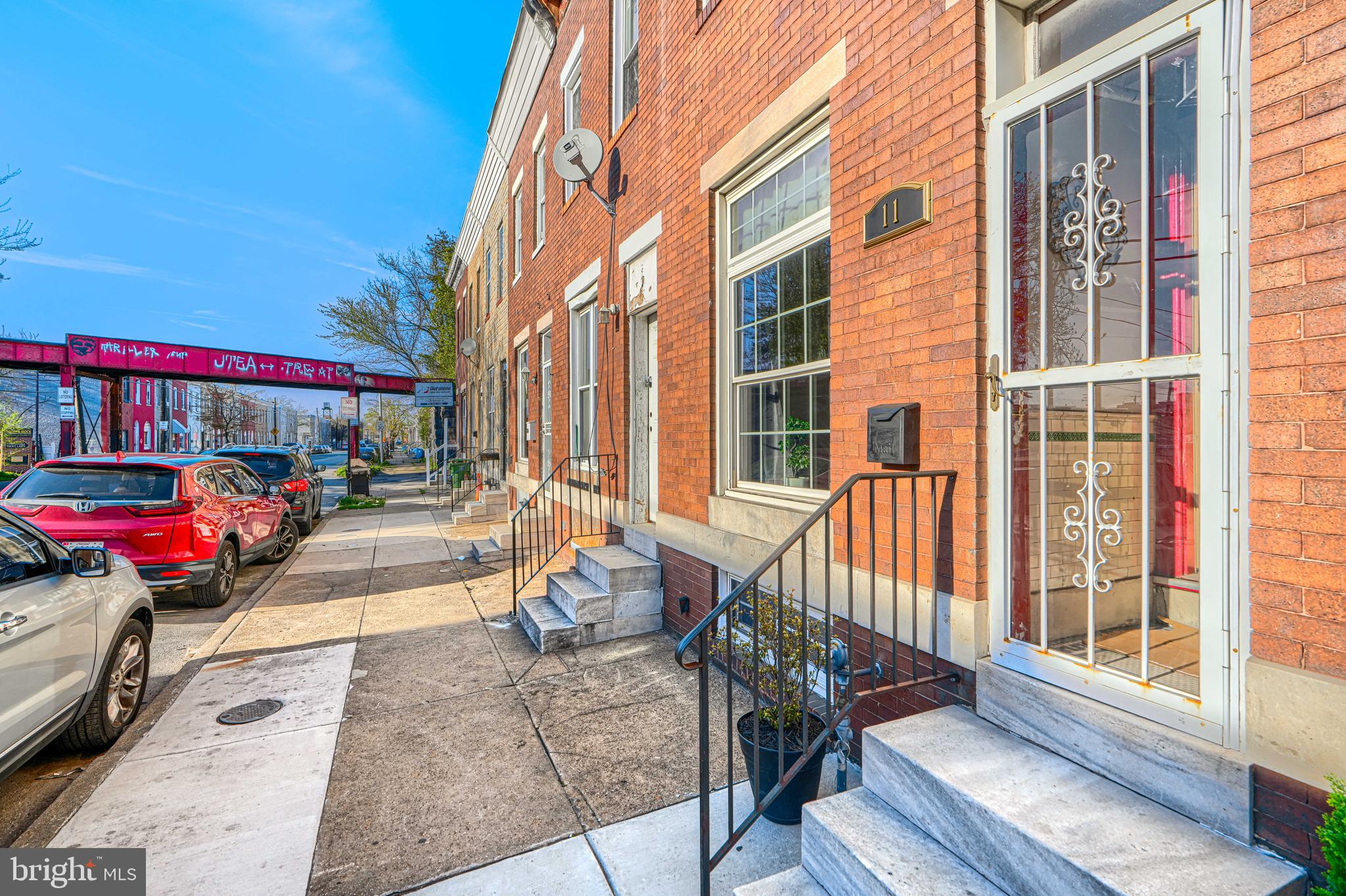 Welcome to this up and coming area 11 south Kresson.  This charming row home features 2 bedrooms and 1.5 baths, offering an open and airy main level with high ceilings, a convenient half bath, and a spacious living/dining area. Step outside to enjoy a large fenced-in yard—perfect for entertaining or relaxing. This home is freshly painted, new luxury vinyl flooring, throughout, 
an original tin ceiling, large pantry, new appliances and under cabinet lighting. The second floor includes two comfortable bedrooms, with large walk-in closet, a full bath, and access to a private deck. The expansive basement provides endless potential for storage or future finishing. Street parking available, with a private spot in the rear for easy access. This property is blocks from Bay View Hospital, 95,  895, a quick ride to Canton waterfront and downtown.