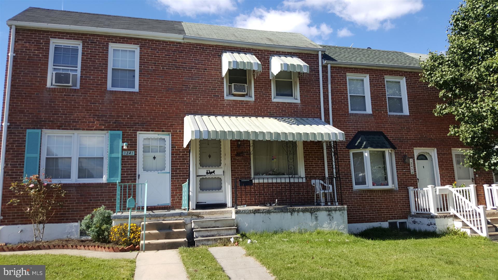 This is an Estate sale sold as-is. All brick town home features covered front and rear porches. Deep fenced rear yard that backs to alley . Open floor plan on main level. Kitchen has been updated in the past. Upper level has 2 bedrooms  and full bath. Bathroom needs updated. Full lower level  offers plenty of room for family or rec room. There is 1/2 bath  and storage area. Has walk out stairs to rear yard.  Easy access to 95  , 695 & rt 40. Close to schools and shopping.