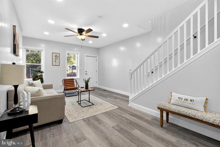 Beautifully renovated 3-bedroom, 1.5-bath townhome offering stylish modern finishes and abundant natural light throughout. The main level welcomes you with a bright open-concept layout featuring luxury vinyl plank flooring, recessed lighting, and a seamless flow from the inviting living room to the dining area and into the stunning gourmet kitchen. The fully updated kitchen is a standout feature, showcasing premium white cabinetry, quartz countertops, stainless steel appliances, custom tile backsplash, and elegant Carrera marble porcelain tile flooring—perfect for both everyday living and entertaining. Upstairs you’ll find three spacious bedrooms with LVP flooring throughout and a beautifully renovated full bathroom featuring a custom Carrera marble-top vanity, ceramic tile surround, tile flooring, and all new modern fixtures. Finished basement. Step outside to a private fenced backyard offering a grassy area and paver walkway, creating a great space for relaxing, outdoor dining, or entertaining guests. Move-in ready and thoughtfully updated, this home offers the perfect blend of modern design, comfort, and low-maintenance living.