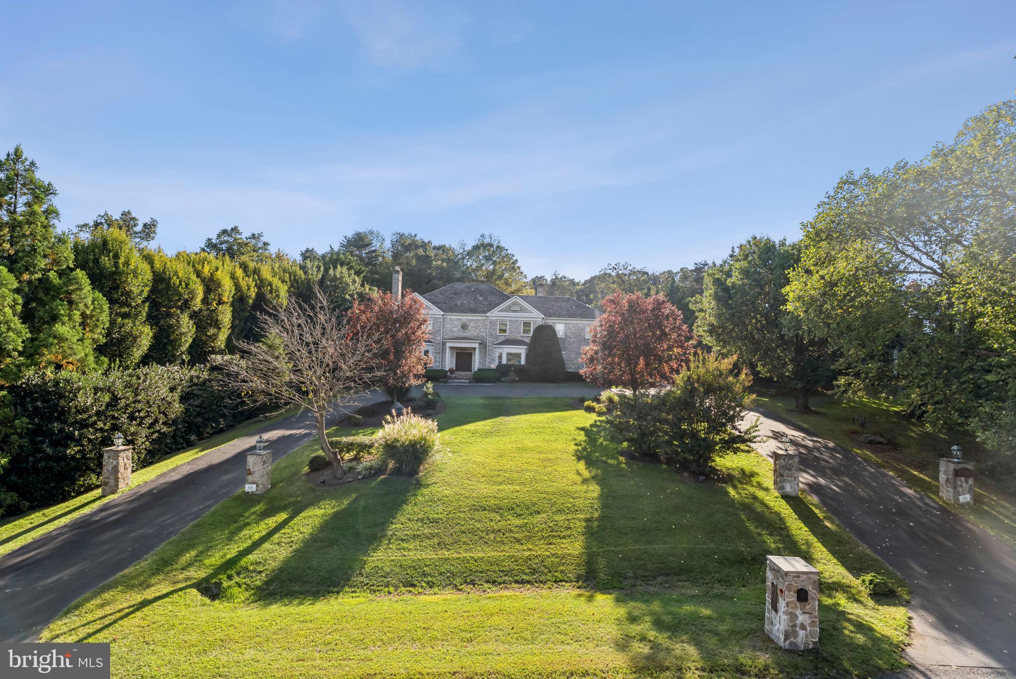 Exceptional value, perfectly sited on a premium lot, with resort-style amenities, this custom home offers over 7,000 square feet of refined living designed for both everyday comfort and effortless entertaining. Architectural details include one gas and multiple wood-burning fireplaces, coffered and beamed ceilings, arched accents, exposed brick, and walls of windows that flood the home with natural light and create a seamless indoor-outdoor connection.
The thoughtfully designed floor plan features gracious formal spaces, a main-level office, and a gourmet kitchen connected to the family room, with an island, large breakfast room addition, expansive screened in porch and direct access to the outdoor patio spaces. The private backyard is a true oasis with professional landscaping, heated pool and spa, Har-Tru tennis court, and a convenient main-level full bath—ideal for summer gatherings.
Upstairs, the spacious five bedrooms include a luxurious primary suite with a fireplace, custom closets, and a spa-inspired bath, along with two additional full baths. The fully finished lower level enhances the home’s entertaining appeal with a sizable recreation room, fireplace, wet bar, full bath, and flexible bonus spaces perfect  for guests.
Located within the renowned Winston Churchill High School cluster and just minutes to Potomac Village, country clubs, shopping, dining, and major commuter routes, this remarkable property offers timeless elegance, modern updates, and an exceptional lifestyle in one of Potomac’s most desirable neighborhoods.