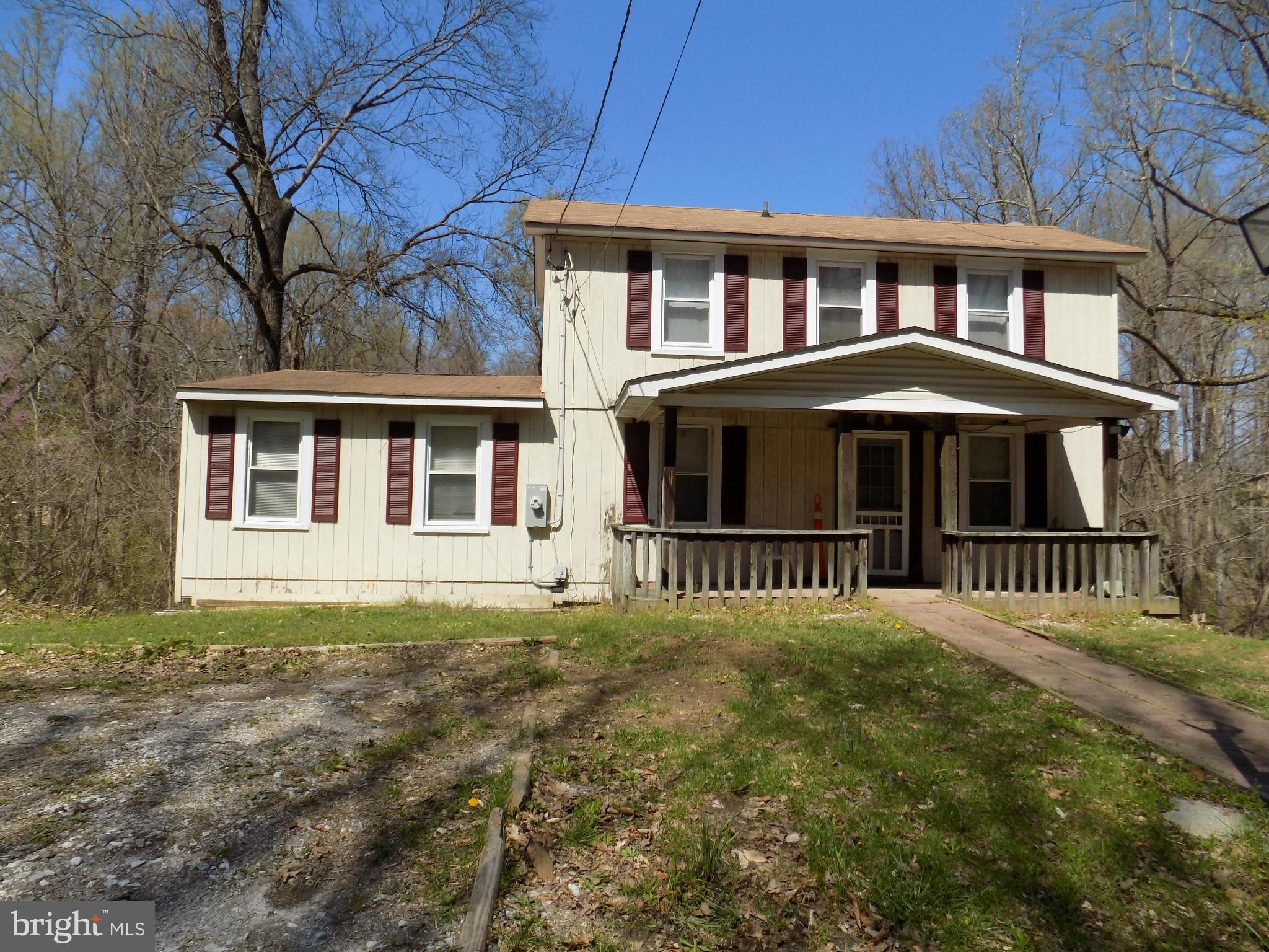 Renovate existing home or build new one. Mini-Farmette! 4.95 Acres with a stream - Who needs a pond when you have your very own babbling brook! Welcome home to your private oasis! Brand New Oil Furnace installed 2016. Updated 200 Amp Service Panel. Septic drain lines approximately 5 years old. Possible subdivision - buyer to verify all costs related to subdivsion. Grow your own veggies!
