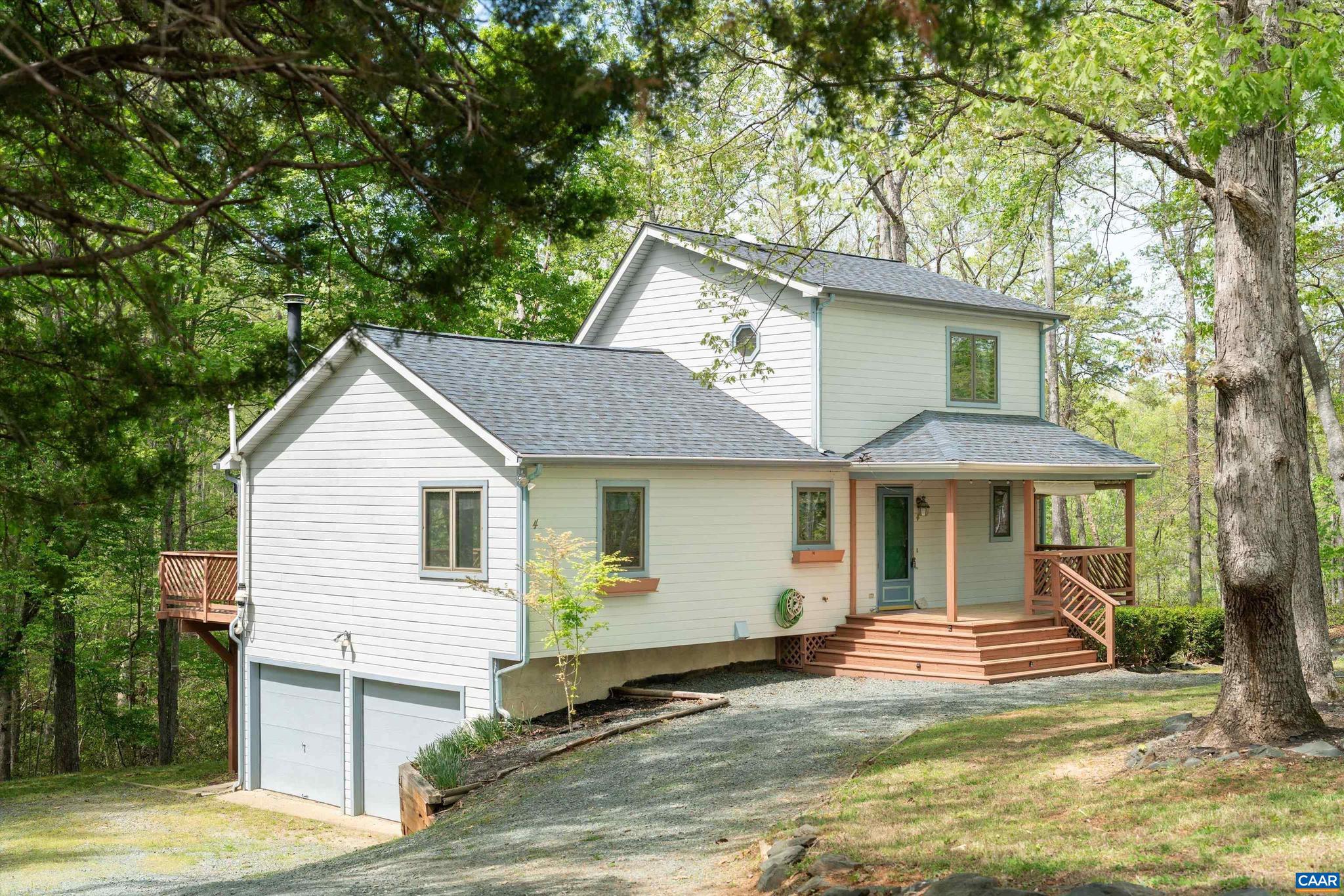 OPEN HOUSE SATURDAY, MAY 30th from 2-4pm!  Welcome to 4 Nutwood!  Located at the end of a cul-de-sac on an oversized 1.33 acre level lot, this fabulous 3 bedroom, 3 bathroom home features a new roof (2025) with new gutter guards (2025) and new plumbing through out (NO quest)!  Come enjoy tons of privacy on your back deck with a retractable awning and there is plenty of space outdoors including a firepit area. The kitchen is spacious with painted cabinets and granite countertops.  The floors throughout the main level living space have been updated to LVP and the living room has high vaulted ceilings with a stone wood burning fireplace. There is a primary bedroom and full bath on the main level plus another bedroom and full bath upstairs that could be used as a primary suite.  Downstairs also has LVP flooring and it's own separate entrance, full bedroom and full bathroom.  Seller is offering a $5,000 closing cost credit toward buyers closing costs!  Come See TODAY!,Granite Counter,Painted Cabinets