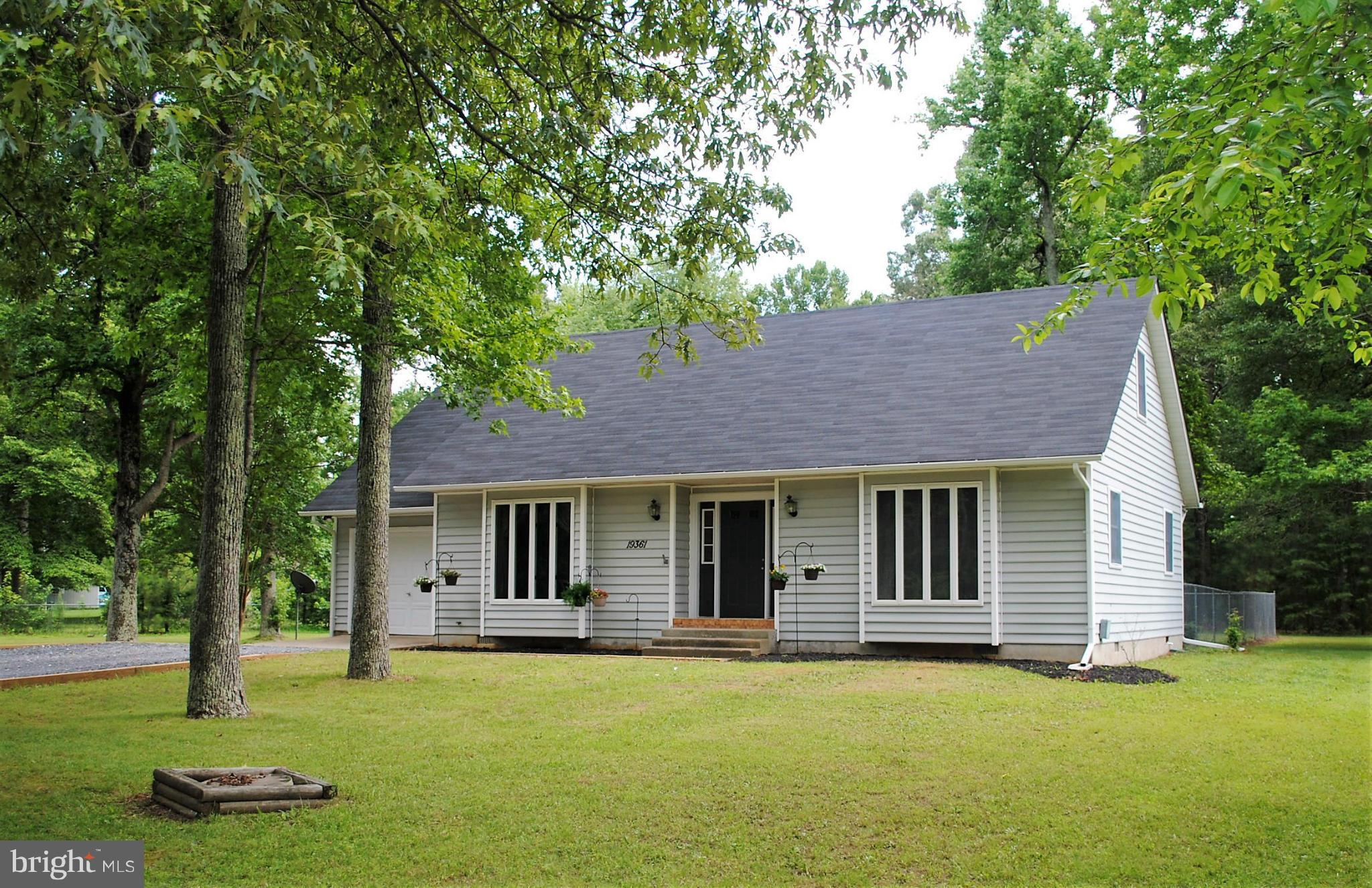 Great Location in the country and close to St Mary's College and PAX 4 bedroom, 2 bath 1 car garage on 1.77 acres. Hardwood floors through out house -12 X 20 deck and patio fenced in yard plus a bonus room above garage perfect for storage or a play room.  New roof just installed.