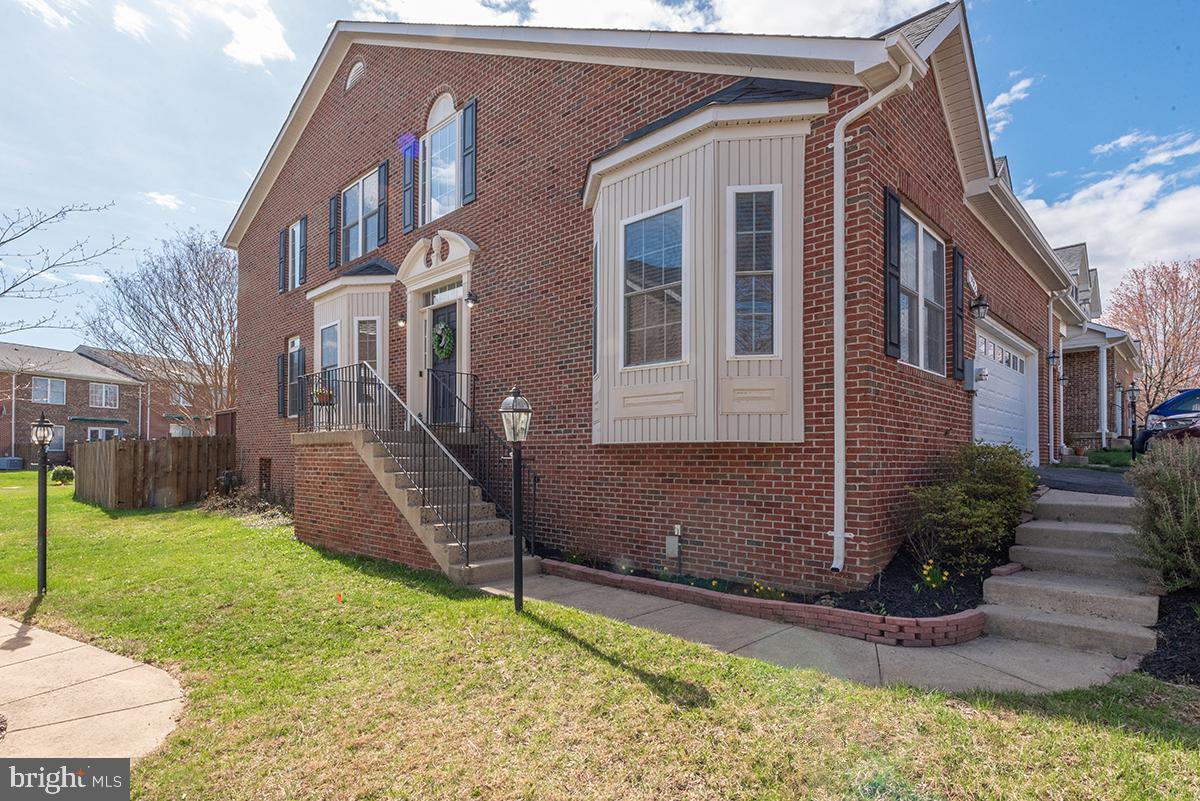 NEW IMPROVED PRICE :) ...Discover the perfect blend of comfort and convenience in this stunning all-brick home, nestled in the heart of charming Warrenton, Virginia. Located in the highly desirable "Northrock Community" with low HOA. This residence boasts three finished levels, an abundance of natural light, and modern amenities designed for effortless living. Step inside to find gleaming hardwood floors and neutral white walls, creating a bright and airy atmosphere throughout. The heart of the home is the bright white kitchen, featuring stainless steel appliances and a stylish new farmhouse style backsplash, perfect for culinary enthusiasts. Enjoy the dramatic two-story great room, anchored by a towering stone gas fireplace, creating a cozy and inviting space for gatherings. A main level primary bedroom with an en-suite bathroom provides convenience and privacy. Two laundry areas, one on main level in kitchen (stackable washer & dryer convey) and one in the basement. Three finished levels offer ample space for living and entertaining. Fully finished lower level offers a den with an electric fireplace, full bathroom, storage area an a "Bonus Room". Make this extra room anything you'd like or enjoy. Perhaps a craft, office or gym room? Endless possibilities...Situated on an oversized corner lot, the fully fenced yard provides a private oasis. A spacious wood deck is ideal for outdoor grilling, entertaining and relaxation. 2 car front load oversized garage.  Experience the charm of in-town living, with close proximity to shopping, banking, schools and parks.  Explore the quaint boutique shops, galleries, restaurants and bars of Old Town Warrenton, just walking minutes away. Enjoy the quiet, established atmosphere of the sought after Northrock Community.  Don't miss the opportunity to make this exceptional Warrenton home your own! Schedule a showing to experience its charm, elegance and value.  Professional Pics are coming soon!