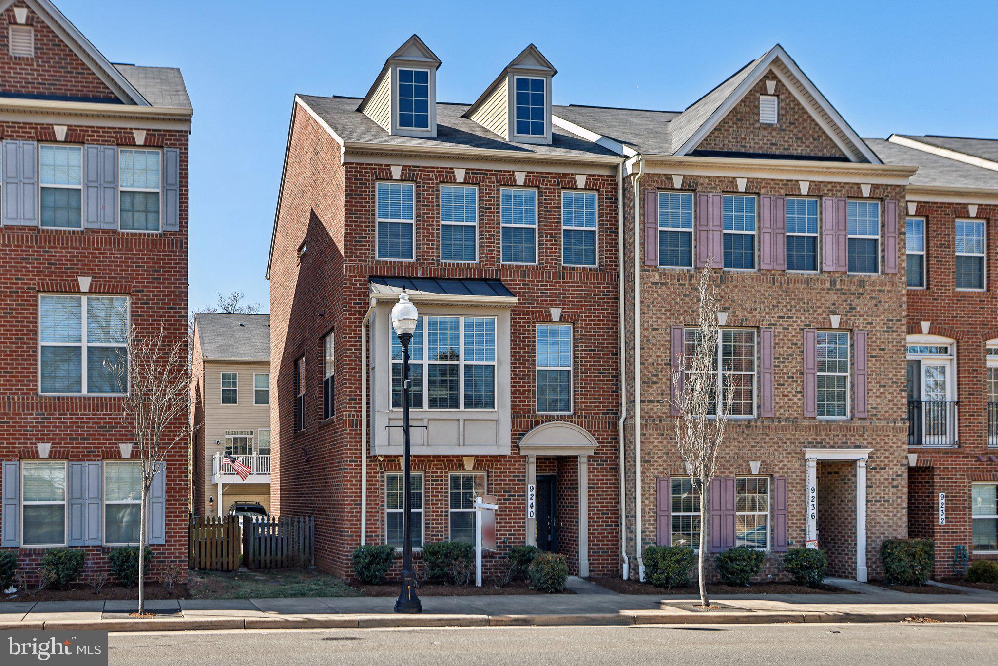 Gorgeous 3-level 2 Garage end-unit townhouse. Enjoy the low HOA only $66/ month with easy access to a variety of shopping, dining, and entertainment options, historic Old Town Manassas, and Amtrak—all just a short walking distance. The location is also close to the VRE.  A must see, this beautiful home is located in the Prescott Court Community. One of the larger models of the community, the home has 2,360 sq ft of living space. The home features 3 bedrooms, 2 and a half baths. Two of the full baths are on the upper level. The living room, dining room have an open concept that leads to an open large kitchen on the main level. The lower level is finished with a garage.  The deck off the main level is a low maintenance vinyl railing deck.